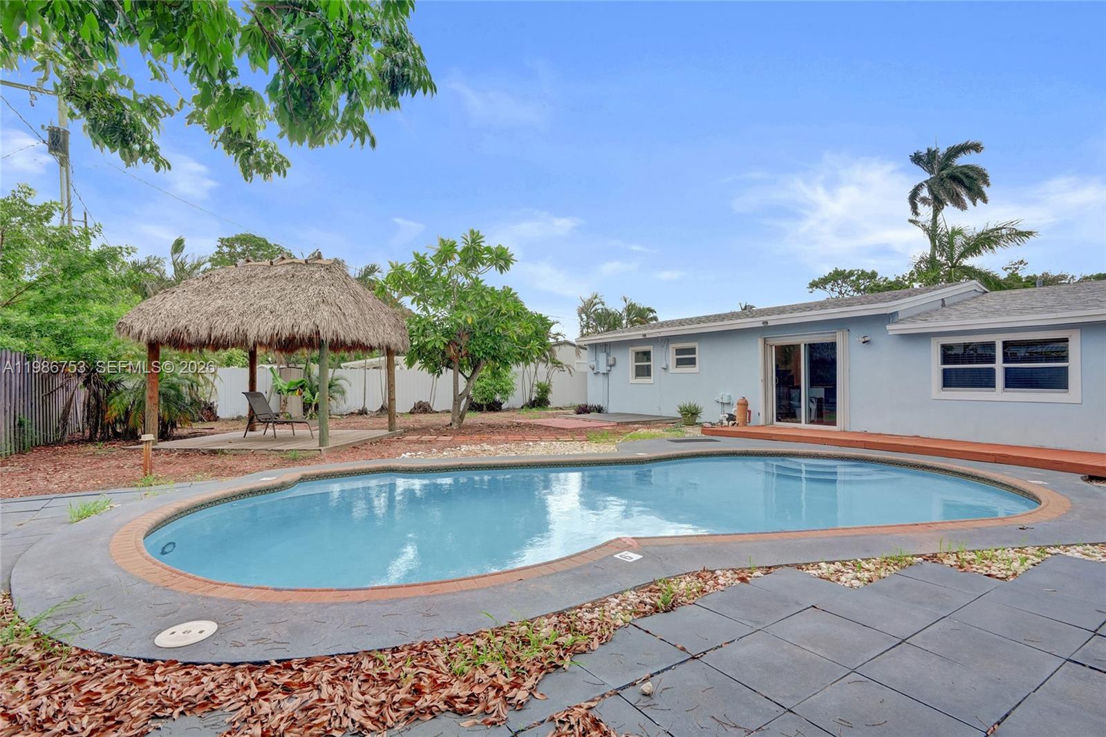 Welcome to this exceptional residence nestled in the heart of the picturesque Riverland. If you know, you know! This remodeled 4BR/2BA boasts quartz countertops, a modern kitchen, impact windows, and updated bathrooms. Pool, tiki hut & expansive lot perfect for entertaining. Fully fenced with ample space for boat, trailer & recreational equipment. Minutes from I-95, turnpike, short journey to the ocean by boat - no fixed bridges. Large circular driveway. New pool pump and flooring. House just appraised for $644k! Priced under market value. Seller is motivated!!! Back on market because buyer did not qualify for the loan.