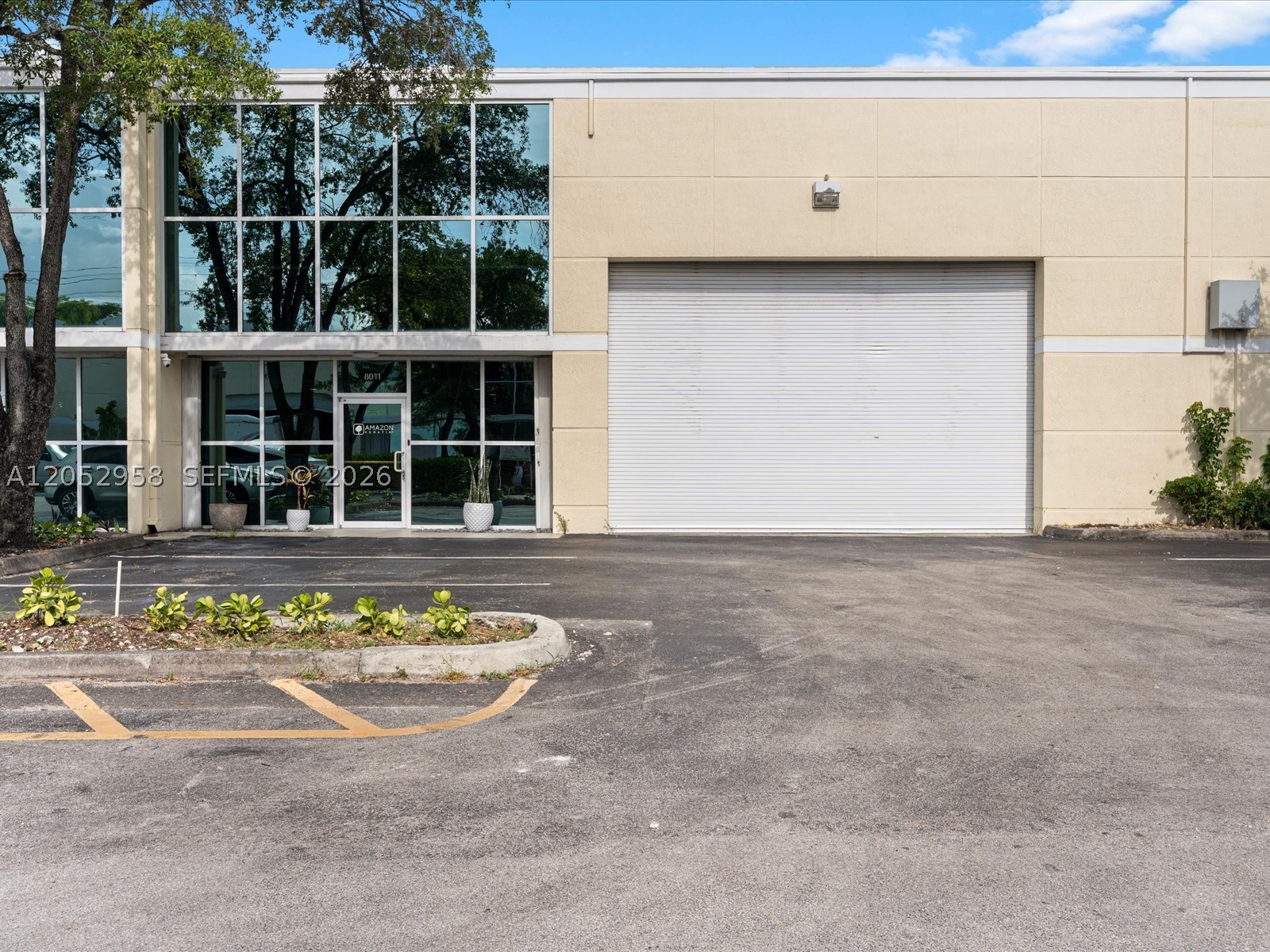Completely renovated and move-in ready, this ±5,000 SF industrial warehouse condominium offers a rare opportunity for owner-users and investors in the heart of Doral's Airport West industrial market. Ideally located less than two miles from Miami International Airport with immediate access to SR-826, SR-836, Florida's Turnpike, and other major transportation corridors. The property features approximately 1,600 SF of modern office/reception/showroom space and 3,400 SF of fully air-conditioned warehouse with 20' clear ceiling height, a 14'H x 22'W motorized roll-up door, and both a concrete loading ramp and recessed dock-height loading for maximum operational flexibility. Recent capital improvements include upgraded electrical service, newer HVAC systems, and a recently resealed roof minimizing future capital expenditures. Ideal for import/export, logistics, manufacturing, aviation support, medical, technology, e-commerce, and other industrial users. Contact listing agent for additional information or to schedule a private tour.
