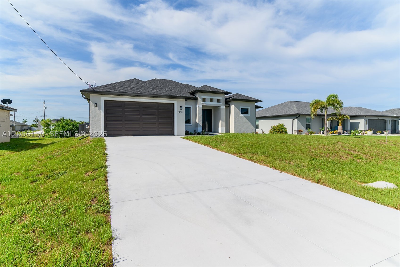 Welcome to this exceptional 2026 new construction home located in one of Northwest Cape Coral's most sought-after areas, west of Burnt Store Road. Perfectly positioned on a desirable south-facing waterfront lot, this stunning residence offers beautiful water views stretching toward open sailing access and captures natural sunlight throughout the day. Designed with both comfort and entertaining in mind, this spacious 4-bedroom, 3-bath home features soaring ceilings, an open-concept floor plan, and thoughtfully selected high-end finishes throughout. The bright and inviting living spaces flow seamlessly into the outdoor area, creating the ideal setting for enjoying the Southwest Florida lifestyle. The southern rear exposure provides the perfect opportunity for a future pool, allowing you to maximize sunshine and outdoor enjoyment year-round. Best of all, no flood insurance is required, offering added peace of mind and value. Conveniently located near Coral Oaks Golf Course, Burnt Store Boat Ramp, restaurants, shopping, and the exciting future Seven Islands waterfront district, this home combines modern luxury with one of Cape Coral's most promising locations. Move-in ready and built for today's lifestyle, this is your opportunity to own a brand-new waterfront home in a rapidly growing area of Southwest Florida.
