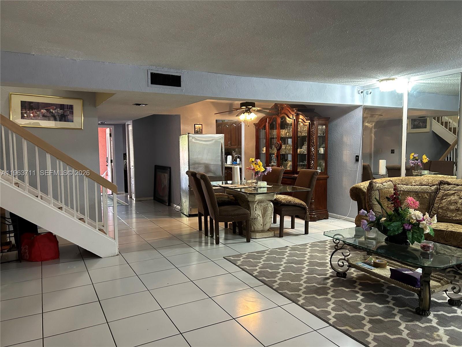 Rare opportunity for a ~~spacious ~~ townhome at a great price! Step inside this centrally located 2-story townhouse in a welcoming neighborhood. This home offers 3 large bedrooms and 3 full bathrooms, plus a converted garage currently used as a 4th bedroom that can easily be returned to a garage. The large primary suite features space for a home office, an oversized walk-in closet, and a generous bathroom with Roman tub and separate shower.

Enjoy granite kitchen countertops, ceramic tile in main living areas, laminate flooring in bedrooms, a wet bar off the living room, and an open living/dining great room. Relax on the screened patio overlooking a spacious backyard. Community amenities include a pool, tennis courts, and scenic walking areas. Conveniently located near the Florida Turnpike and major highways, with low HOA fees of $255 monthly. HOA takes care of the roof and exterior painting. Call today to schedule a showing.

*This is a condo townhome, please ensure your lender is aware*