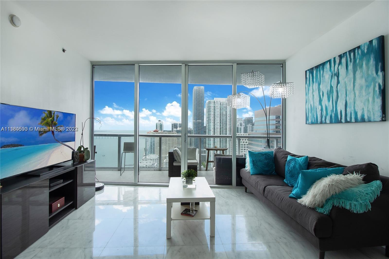 Best South views unit at Icon Brickell Tower II, 2 bedrooms + Den that could be 3rd bedroom or office, marble floors, sun shades/blackouts in bedrooms, walk-in closets, Italian kitchen cabinets, wolf/subzero kitchen appliances. Tenant can enjoy water views of Brickell Key & Key Biscayne and have privacy. No Pets. 1-parking space. BLDG offers basic cable, WIFI, State of the Art amenities: Fitness center w/classes, full service spa and restaurants.
