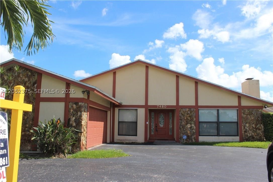 Imagine spending your weekends lounging by your own sparkling pool, hosting epic backyard barbecues, and living in a completely turnkey home where every detail has been beautifully updated for you. Welcome to 7480 NW 37th Ct, Lauderhill, FL, a stunning 3 bedroom, 2.5 bathroom pool home that perfectly blends luxury, comfort, and space.

From the moment you walk through the door, the bright, airy open layout invites you in. The chef in the family will fall in love with the gourmet kitchen, which features custom cabinetry, premium granite countertops, stainless steel appliances, and elegant recessed lighting.

Your primary bedroom suite is a massive retreat featuring oversized walk-in closets, while the second and third bedrooms are much larger than average, making them perfect for family, guests, or a dedicated home office. Every bathroom feels like a spa with new vanities, contemporary fixtures, and sleek glass shower doors.

The outdoor space is a true private paradise. The fully fenced backyard offers maximum privacy, surrounding a beautiful pool ready for year-round Florida sunshine.

Bring all your vehicles, boats, or toys! This property offers a full 2-car garage plus a massive driveway that easily fits up to 7 vehicles, which is an absolute rarity for the area.

This Lauderhill gem is priced to sell quickly and will not last. Schedule your private showing today and move in just in time for pool season!