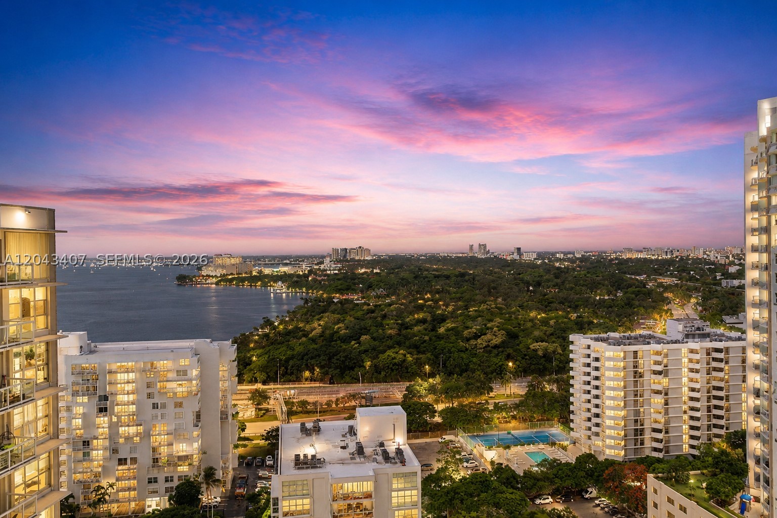Penthouse opportunity in one of Brickell's most desirable waterfront communities. This bright and spacious residence features an open-concept layout with floor-to-ceiling windows, modern wood flooring, custom built-in cabinetry, and generous closet space. Enjoy breathtaking city skyline and partial bay views from the expansive balcony and every room. Experience resort-style living with exceptional amenities, including a heated waterfront pool, state-of-the-art fitness center, tennis courts, BBQ areas, indoor and outdoor children's playgrounds, on-site coffee shop, electric vehicle charging stations, complimentary Wi-Fi throughout the property, valet service, and more. Ideally located in the residential section of Brickell, just steps from the Rickenbacker Causeway, offering easy access to cycling, running, and water activities. Only minutes from Brickell's Financial District, world-class dining and luxury shopping, while enjoying the tranquility of a true waterfront neighborhood.