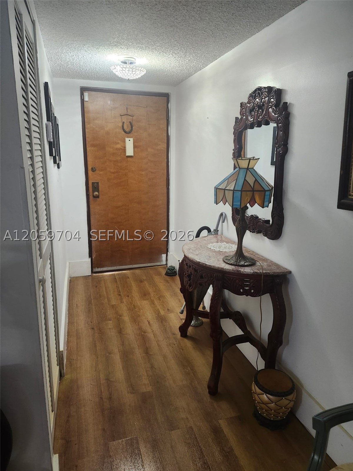 Rare opportunity to own a beautifully remodeled 2-bedroom, 2-bath first-floor unit in the sought-after Kenland Bend North Condos community. Both bedrooms are generously sized as true master suites, offering exceptional space, comfort, and flexibility. This move-in-ready home features a private walled patio with sliding-door access, opening directly onto lush, professionally landscaped common areas—your own peaceful outdoor retreat. Enjoy the convenience of an in-unit washer and dryer, plus an updated kitchen outfitted with a new stove, new refrigerator, new dishwasher, microwave, and garbage disposal (approximately 2 years old). Additional recent upgrades include a new A/C unit and a new tankless water heater. The primary bathroom is handicap-accessible for added comfort. Situated in a gated community with private security, Kenland Bend North Condos offers wonderful community amenities including a sparkling pool and tennis court, and is pet-friendly with no rental or age restrictions—ideal for homeowners and investors alike. Unbeatable location just minutes from shopping centers, theaters, major highways, and more. Owner-occupied; please call the listing agent to schedule your private showing.