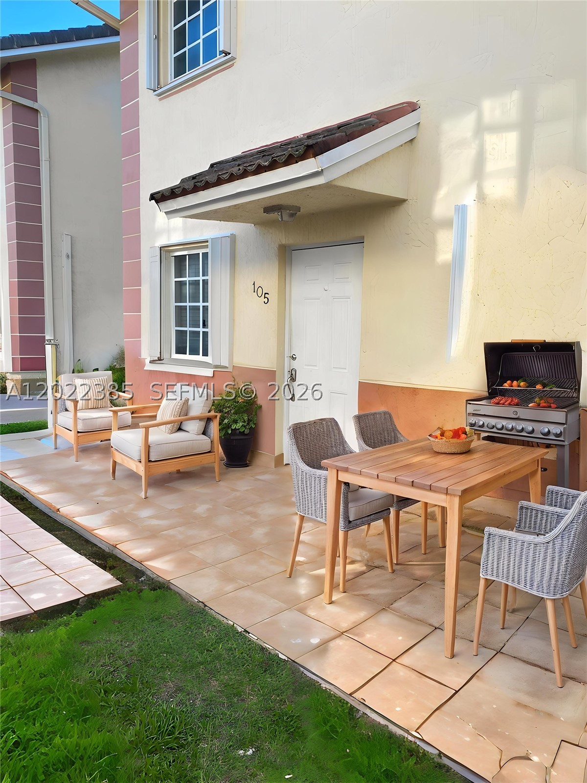 Beautiful 2-story townhouse featuring 3 bedrooms and 2 bathrooms in an excellent location just minutes from the Palmetto Expressway. One bedroom conveniently located on the first floor, renovated bathrooms, spacious living areas, ceramic floors throughout, and a wood kitchen with granite countertops. Bright and freshly painted unit with a front patio perfect for relaxing and entertaining. Laundry inside the unit and 2 assigned parking spaces. Ideal for investors — currently rented. Great investment opportunity!