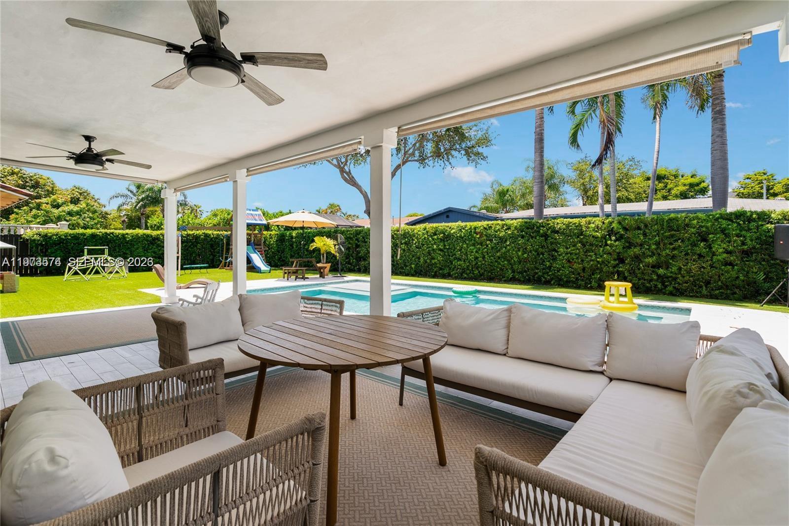 Live the South Florida dream in this fully updated 4-bedroom, 3-bathroom home in the prestigious Saga Bay area of Cutler Bay. Featuring a stunning oversized primary suite with a private bathroom and a large walk-in closet, this home offers comfort and sophistication at every turn. Updated Kitchen with granite counter tops. Modern finishes and thoughtful upgrades throughout make this property truly move-in ready. Garage previously converted adds total living sq ft to approximately 2k sq ft. Enjoy your own backyard paradise with a heated saltwater pool ideal for relaxing evenings and unforgettable gatherings. Artificial turf backyard, Roof is 2019, impact windows, EV charger ready & connection for generator. Located minutes from Palmetto Bay and Pinecrest and zoned for top-rated schools, this home combines luxury, location, and lifestyle in one exceptional opportunity.