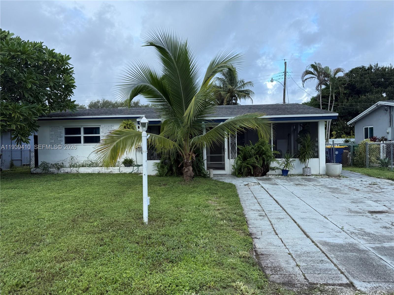 Well-maintained single-family home in Fort Lauderdale offering a functional layout, spacious living areas, and a generous lot with mature fruit trees. Located just down the street from a neighborhood park with a scenic lake, ideal for walking, relaxing, and outdoor enjoyment. Hurricane-impact, noise-reducing windows provide added comfort, energy efficiency, and peace of mind. Conveniently close to major highways, shopping, dining, and everyday essentials. A great opportunity to own in a desirable Fort Lauderdale neighborhood with room to personalize or add value.