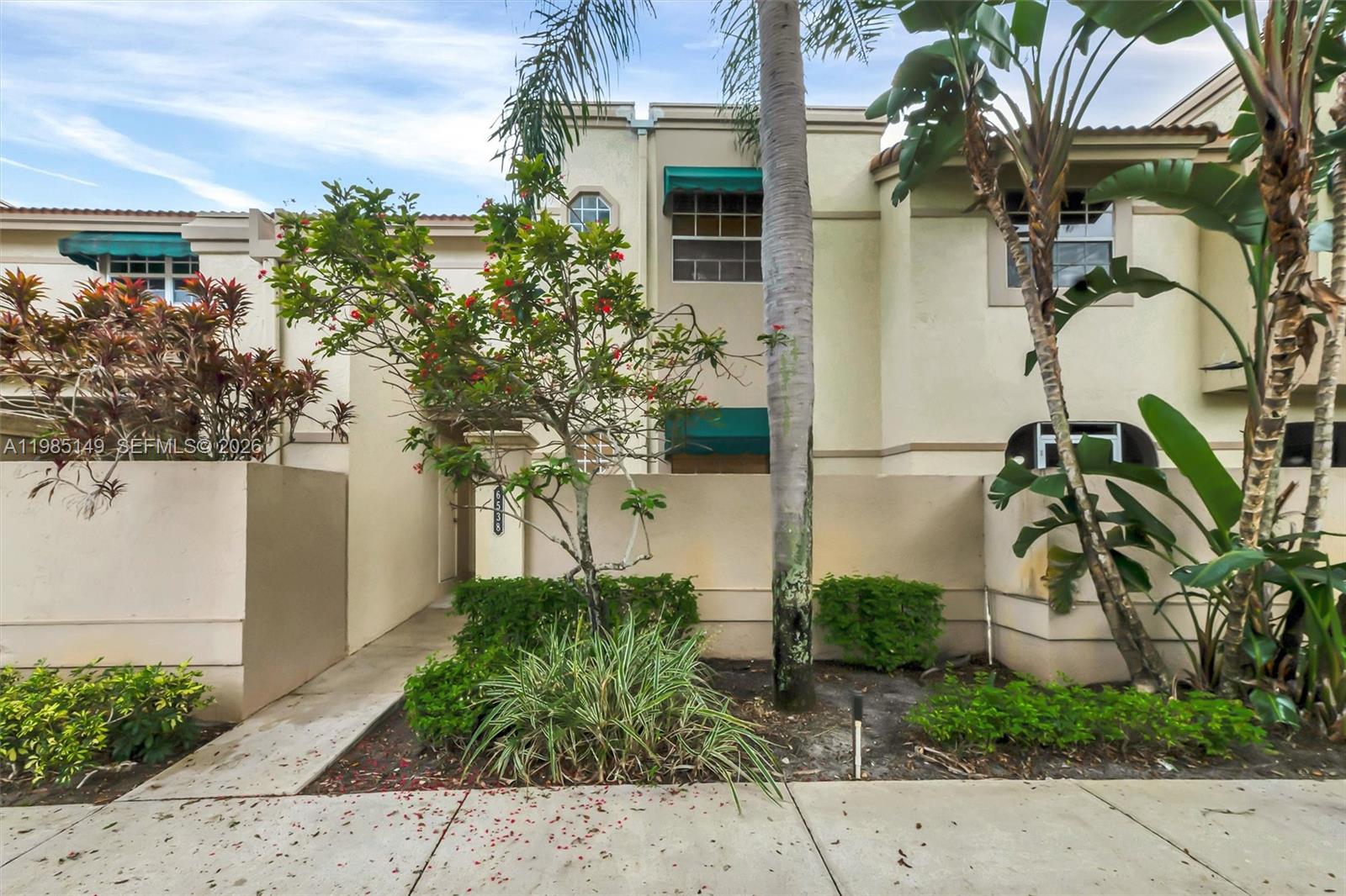 TRULY ONE OF A KIND—COMPLETELY UPDATED, BRIGHT, AND SPACIOUS! This beautifully remodeled 2-bedroom, 2-bath condo in Plum at Boca Pointe features a modern open floor plan and a fully enclosed patio with impact windows and doors, perfect for year-round enjoyment.
Inside, you’ll find elegant travertine and laminate flooring, a brand-new kitchen with quartz countertops and custom cabinetry, smooth ceilings with recessed lighting, and upgraded doors, trim, and custom closets throughout. Both bathrooms have been tastefully renovated with quartz finishes, and the A/C unit is just one year old. Under air 1,112 sq ft. Enjoy the convenience of being within walking distance to the community pool. Condo dues cover master insurance, roof maintenance, landscaping, water, alarm, and cable. Investor-friendly with flexible rental options—up to 4 times per year (30-day minimum).