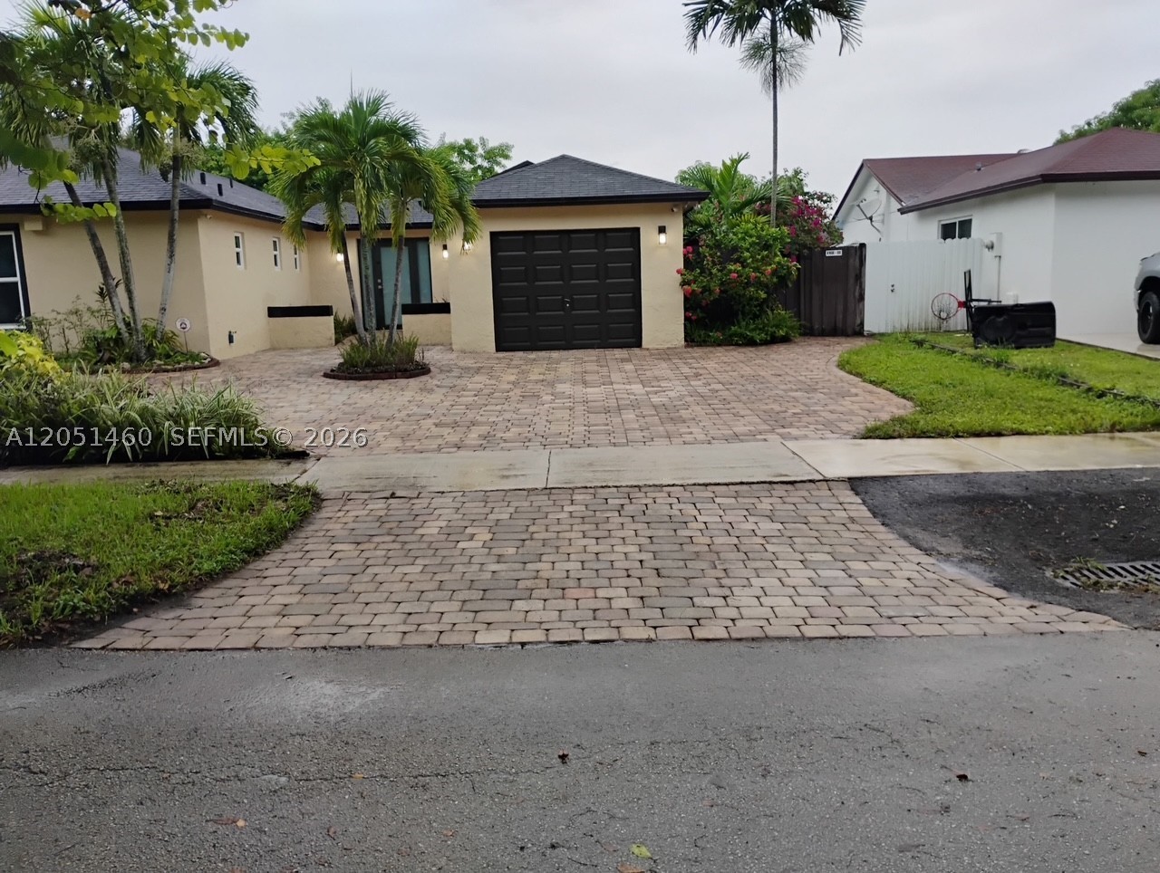 Modern 3 Bedroom. 3 Bathroom home in prime Miami-Dade County location, this move-in-ready gem features, Polished Porcelain tile flooring, Update kitchen with premium Samsung appliances, including double oven range, and 4 doors refrigerator. Master bath with Jacuzzi tub, and skylight. Impact windows and doors. One car garage. Covered terrace. Large patio with fruit trees. This home blends style, comfort, and functionality.