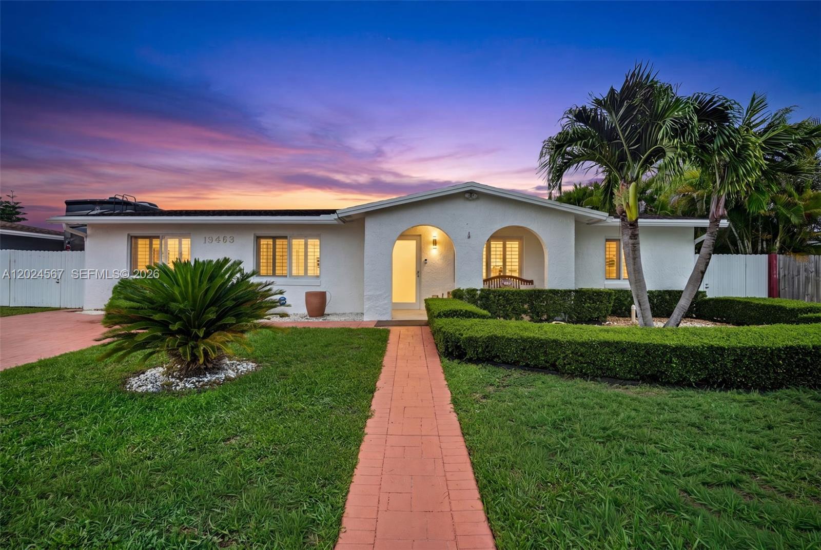 This beautifully maintained 4-bedroom, 3-bath residence offers 2,744 Sq.Ft. of living space on a 7,500 Sq.Ft. lot and welcomes you with warmth the moment you step inside. The open-concept layout features a bright and inviting living area that flows seamlessly into a remodeled chef’s kitchen with it's own pantry  and an expansive family room overlooking the charming huge covered terrace ,your  backyard retreat complete with a commercial-style outdoor kitchen, grill, and refrigerator — perfect for entertaining all year round .
The home boasts two spacious en-suite bedrooms with oversized walk-in closets, a walk-in pantry, and a relaxing indoor sauna added in 2020. Pride of ownership is evident throughout with numerous high-quality upgrades, including impact windows and doors with plantation shutters, mosquito misting system, and a  Generac natural gas whole-house generator connected to city gas (2019), electric car charger and 50 Amp charger for boat and  RVS.  
Additional improvements include two A/C units and ductwork (2018), electric tankless water heater (2018), upgraded electrical panel (2018), storage shed (2019), and a beautifully remodeled kitchen featuring quartz countertops and stainless steel appliances (2018). Wine cooler. Roof 2012 and 2018 (addition). This exceptional property combines comfort, functionality, and modern upgrades in one truly move-in-ready home.
Sorage shed built 2019 
NO HOA !!