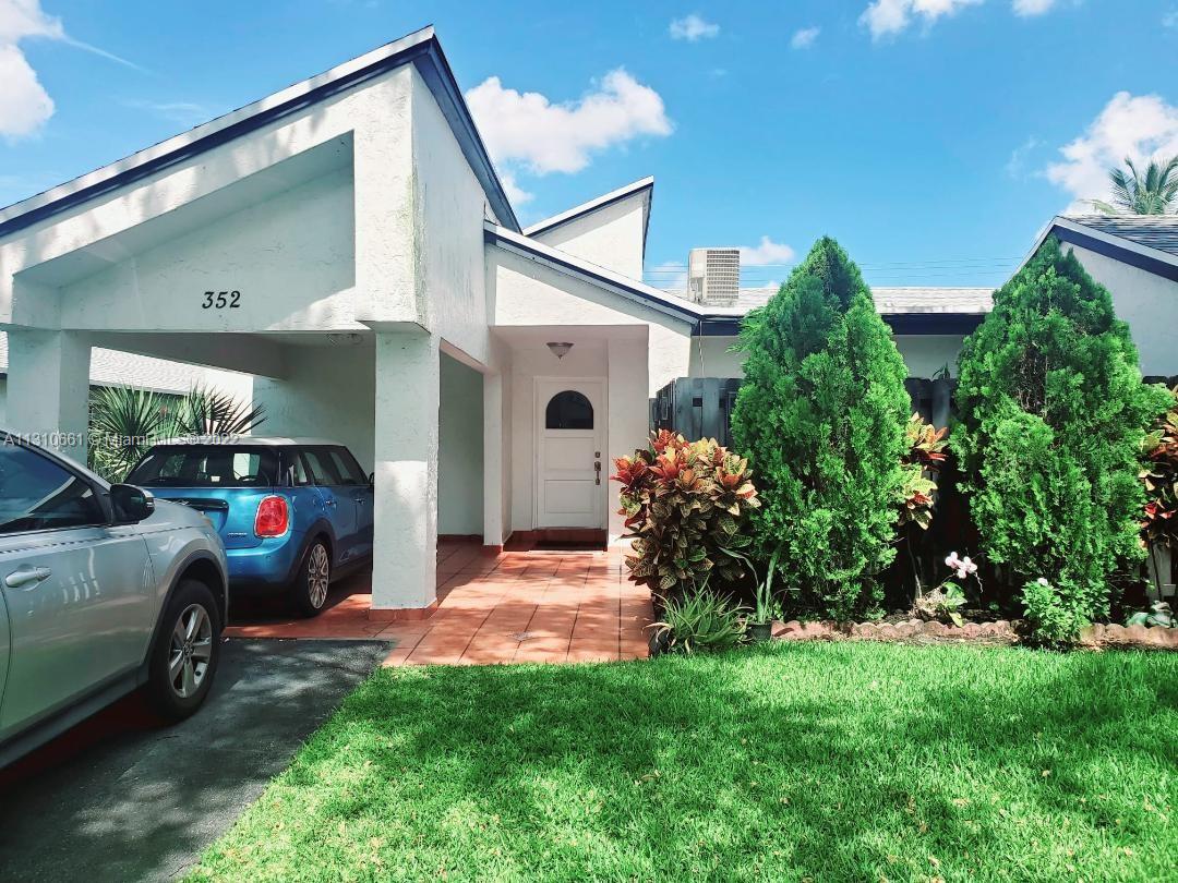 Spacious one- story, Corner unit, 2Bed/2Bath located at Villas at Bonaventure in Weston, Open living/dining space, Oversized master bedroom. Large Covered and Screening patio, Carport for 1 car plus 1 driveway. New roof 2021. HOA fee includes water, comcast basic cable, roof insurance of the building, and maintenance of external areas. Great A+ schools, parks, and recreation. Golf and tennis in close proximity. Mandatory membership a year$315 for the Bonaventure Town center Club (clubhouse, Tennis, Pools and Gym). Community pool. 2 pets Ok. 35lb max weight. A great opportunity to live comfortably here, Sold AS-IS with right to inspect.