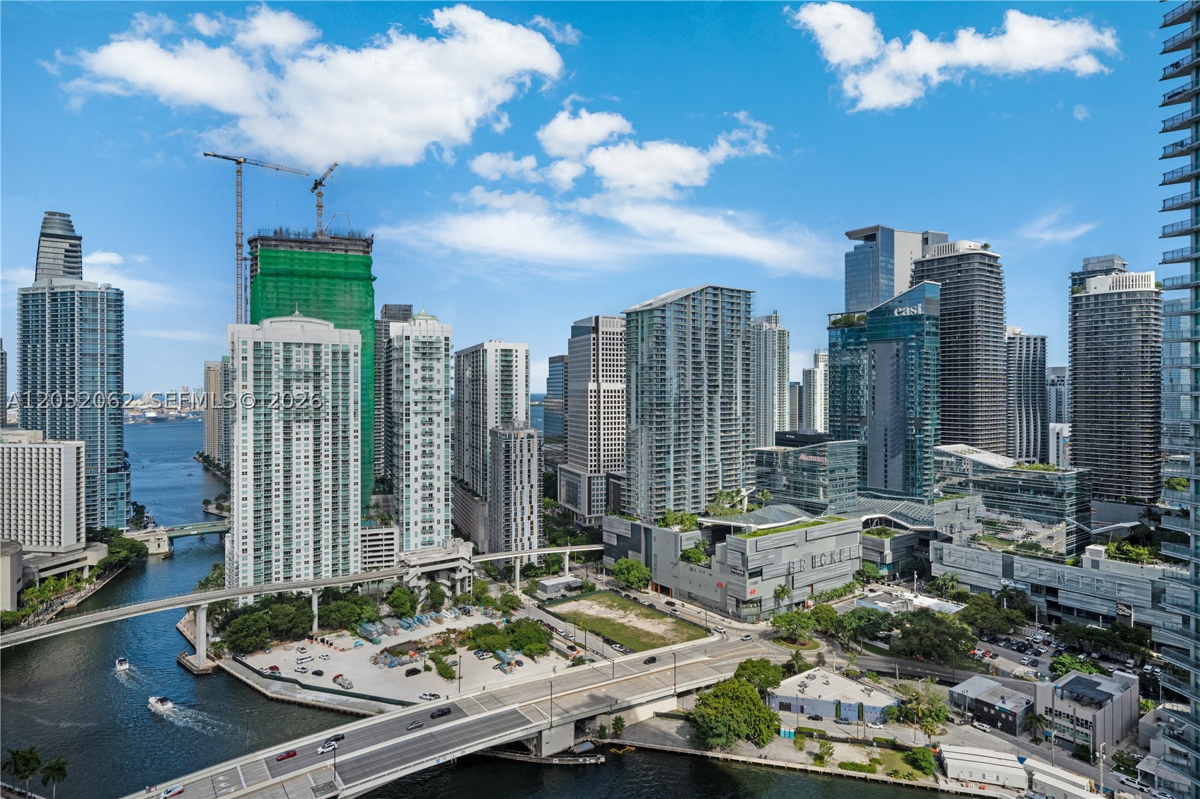 Experience elevated urban living at The Ivy, one of Miami's premier gated riverfront communities. This beautifully maintained residence at Unit 3511 offers one of the most desirable views in the building, with a large balcony and an unobstructed panorama or the Miami River and no direct-facing neighbors, providing exceptional privacy and a tranquil waterfront setting. Floor-to-ceiling impact glass fills the home with natural light, while the private balcony is the perfect place to relax and enjoy breathtaking sunsets and the ever-changing river scenery.  
The modern open-concept layout features a stylish kitchen with top-of-the-line countertops, stainless steel appliances, and ample cabinetry, flowing seamlessly into the spacious living and dining areas—ideal for both everyday living and entertaining. The generous primary suite offers a walk-in closet and a spa-inspired bathroom, creating a comfortable retreat. In addition, this unit has a new A/C. Residents of the Ivy enjoy resort-style amenities including an infinity-edge pool, lap pool, jacuzzi, spa with sauna, state-of-the-art fitness center, children's play area, business center, club room, 24-hour concierge, valet parking, and gated security. Ideally located along the Miami River, with direct access to the Riverwalk and just minutes from Brickell City Centre, Downtown Miami, world-class dining, shopping, entertainment, and highways.