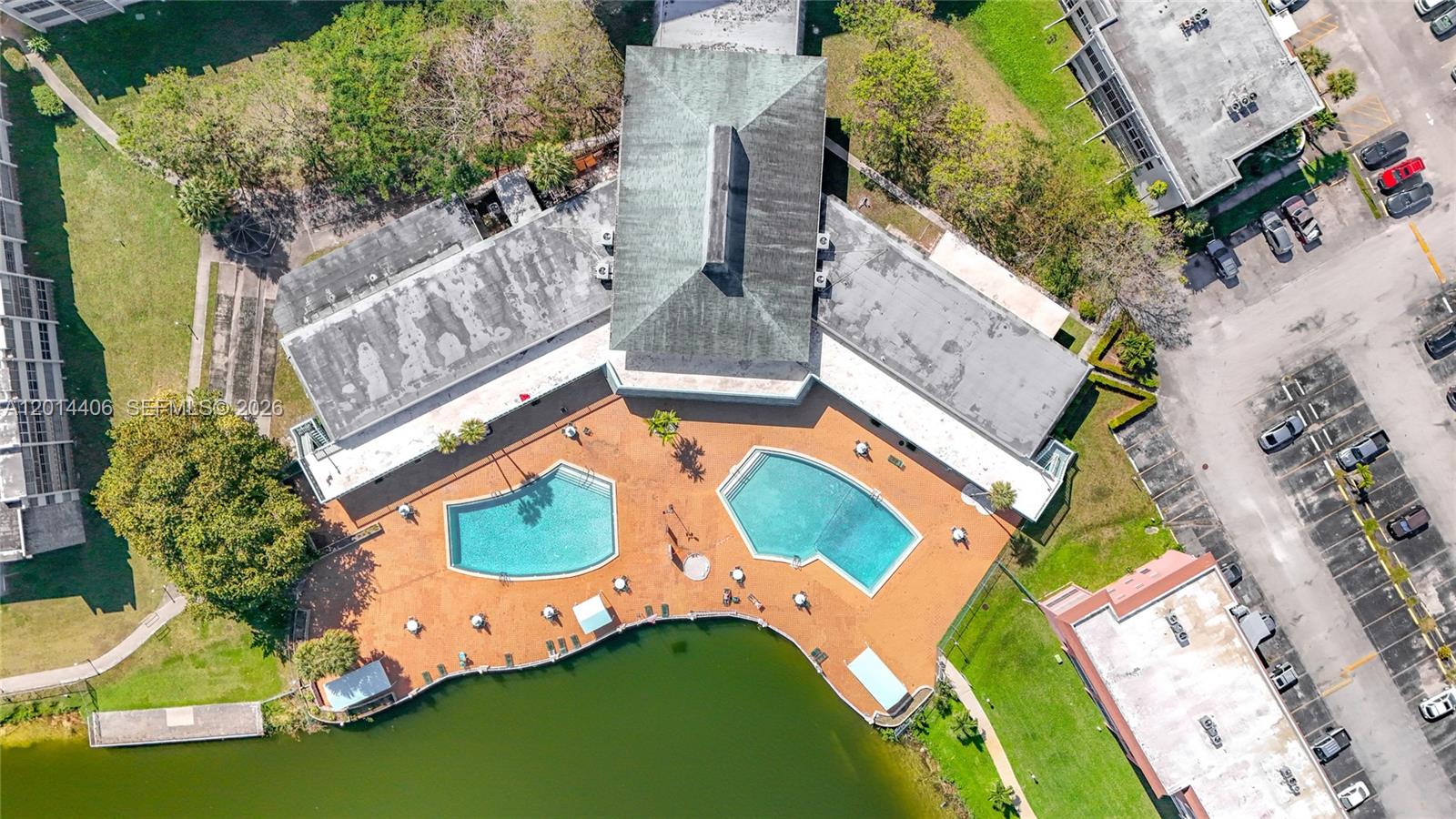 Beautiful 1 Bed / 1.5 Bath plus Den with 1,000 sq ft of living space. Located in a desirable 55+ community just west of Aventura, near shopping, dining, hospitals, and beaches. This bright and inviting condo features tiled floors throughout and an enclosed balcony-turned-den overlooking the pool — ideal for relaxing, working, or extra living space. The bedroom is generously sized with ample closet space.  Enjoy top-tier amenities, including two heated pools with lake views, a fitness center,a clubhouse with a pool table, a sauna, and an event room. Community laundry on the same floor. 1 assigned parking space + guest parking.Maintenance includes water, basic cable, and garbage services. 50-year certification passed.