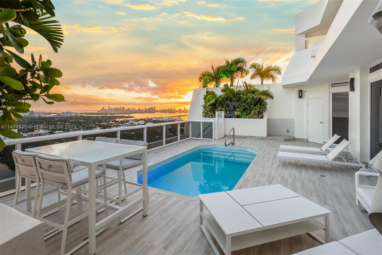 Escape to the epitome of Miami Beach luxury at Tower Suite 4404  a 2 story penthouse where panoramic vistas of the ocean, city skyline, and night lights are just the beginning. This designer-built two-story penthouse boasts a rooftop terrace with a pool, summer kitchen, and spellbinding outdoor space. The primary suite, your personal haven, opens to this rooftop paradise. Luxuriate in the opulent bathroom with a soaking tub and spa shower. Modern design meets cutting-edge lighting with customizable LED hues, while the open kitchen dazzles with top-tier finishes. The modern design is accentuated by stunning white glass floors throughout. Revel in unobstructed south views that redefine luxury living, all within an oceanfront building offering resort-like amenities.