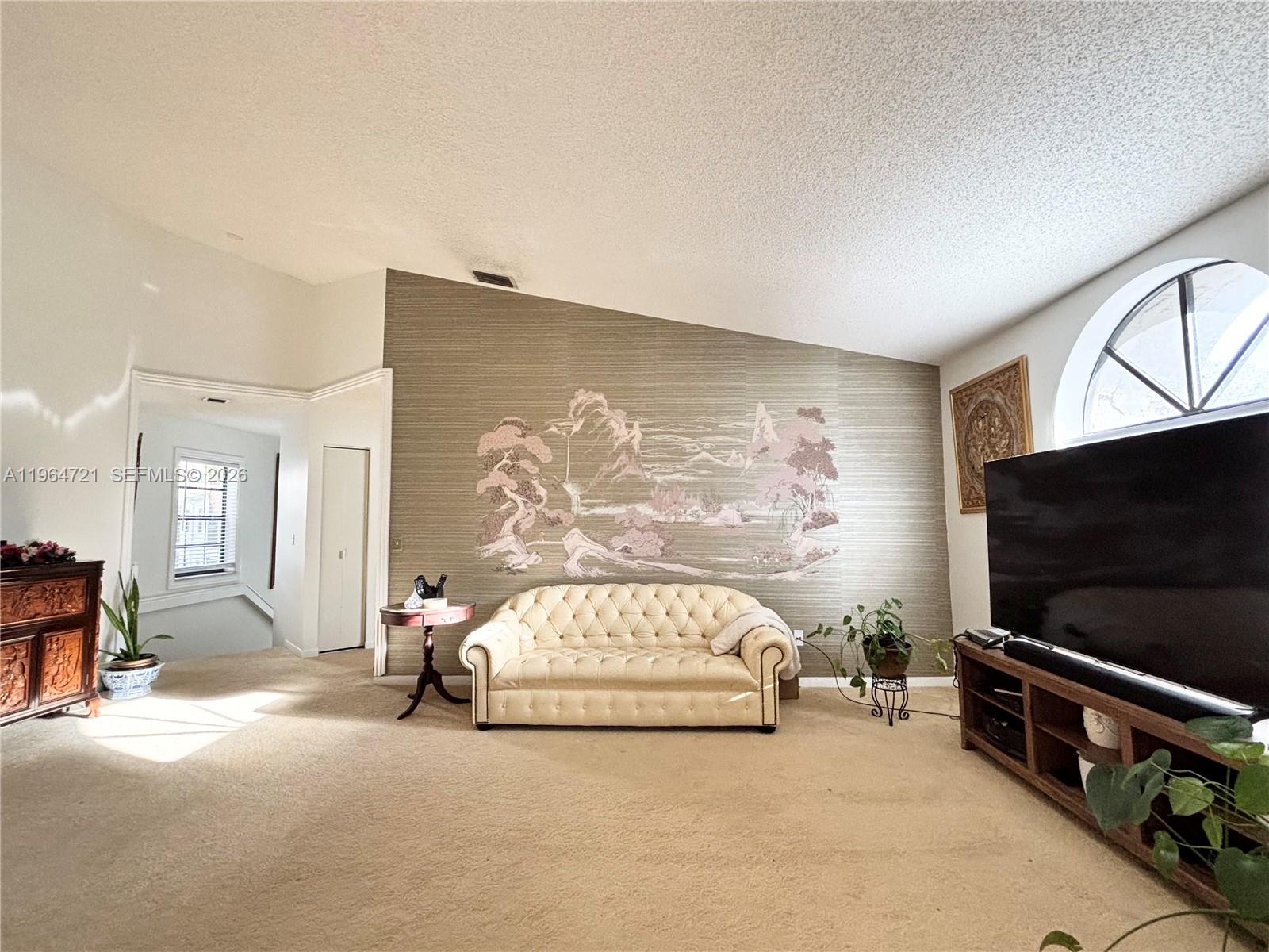 Great location with easy access to the Florida Turnpike and I-95. Ideally situated just 10 minutes from Ocean Inlet Park, this residence offers bright, open living spaces enhanced by recessed lighting, stainless steel appliances, stylish entry fixtures, and ceiling fans throughout. Soaring high-volume ceilings, a generous balcony, and an expansive living room create a light-filled, airy atmosphere while maintaining a warm and inviting feel. Featuring impressive 10-foot ceilings and spacious bathrooms, the home delivers both elegance and comfort. Residents enjoy exceptional community amenities including a clubhouse, three sparkling pools, tennis courts, and more. Maintenance-free living is made easy with included exterior maintenance, cable TV, insurance, pest control, roof repairs, and security. Schedule your private showing today.