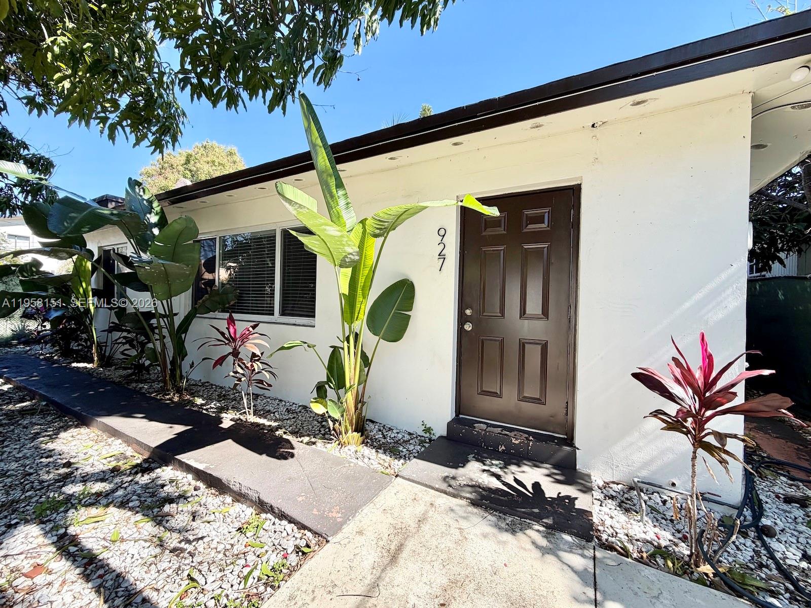 Private 2/1 with an open concept kitchen! Washer and dryer in the house. Private back and front yard. Hurricane impact windows. Mature mango tree. Steps away from Historic Calle 8, restaurants, shopping, and the trolley.