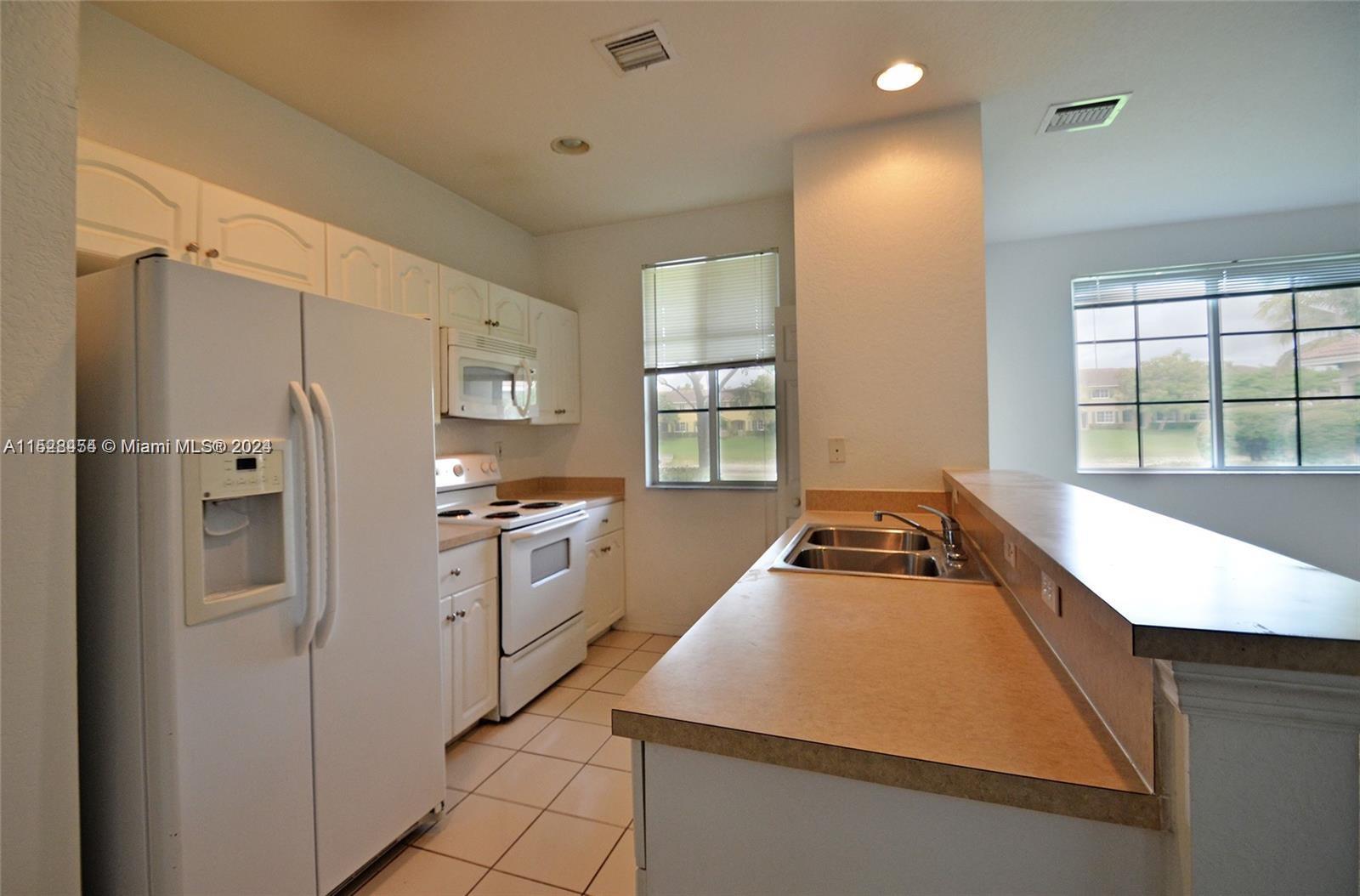 A WARM SOUTH FLORIDA LIVING IS THE ATMOSPHERE @ SAN REMO, BUILT 2007. 2 BEDS 2-1/2 BATH WITH LAKEVIEW. LIVING & DINING FOR THIS 2 STORIES TOWNHOME.   MASTER WALK-IN CLOSET.  BRAND NEW FLOORING IN THE LIVING ROOM AND BRAND-NEW CARPET IN THE BEDROOMS. COMMUNITY FEATURES POOL, CABANA, CLUB HOUSE, & LOUNGE AREA. CLOSE TO SCHOOL, BUS ROUTE PHARMACY & TURNPIKE.