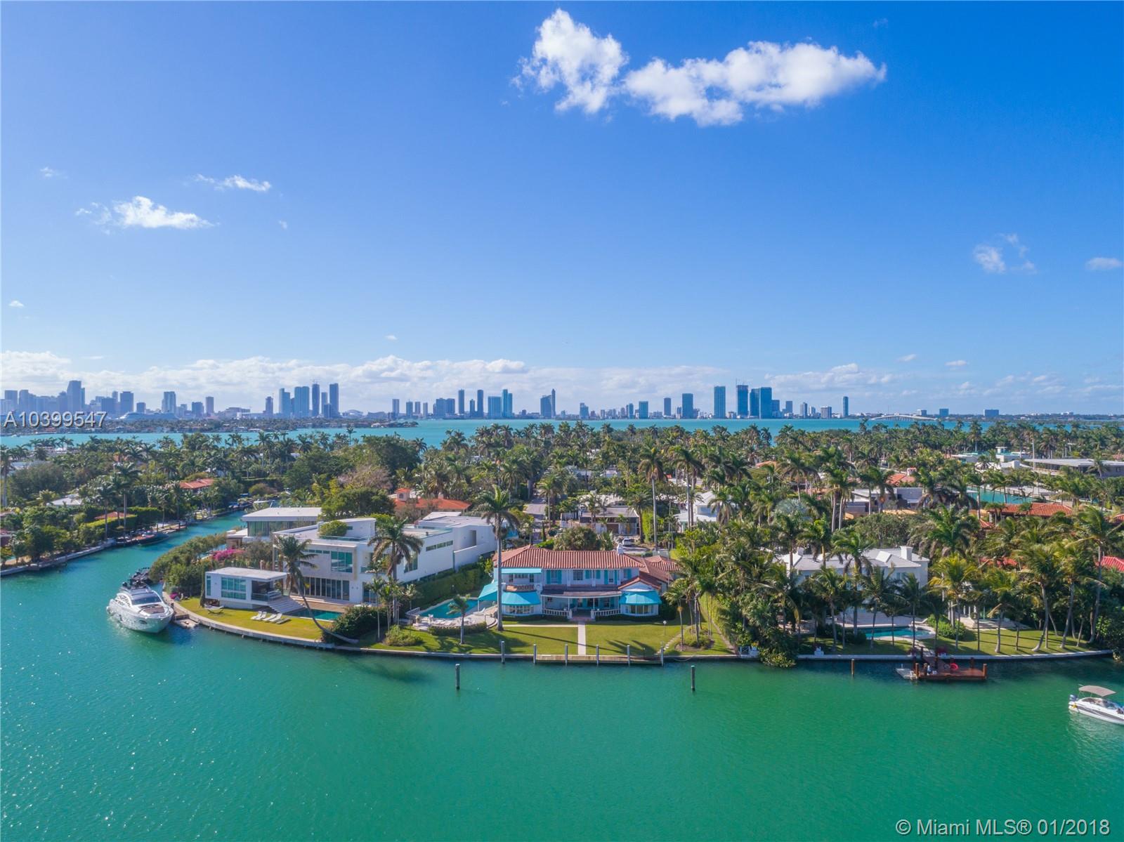 An elegant waterfront estate ready to be restored on the prestigious and gated Sunset Island III. Sitting on an oversized 28,191 SF lot with an impressive 160 feet of water frontage, this 5,190 SF home offers 5 bedrooms and 6 bathrooms, a 2-car garage and a sweeping circular driveway. The premiere estate features natural light throughout, high ceilings, white marble and hardwood floors throughout and large picture windows. The Master Suite features his and her bathrooms and closets as well as a private balcony with breathtaking water and city vistas. The expansive and lush backyard boasts a pool, a large dock and a covered patio for year-round enjoyment. Live steps from bustling Sunset Harbour and world class restaurants, shopping and beaches.