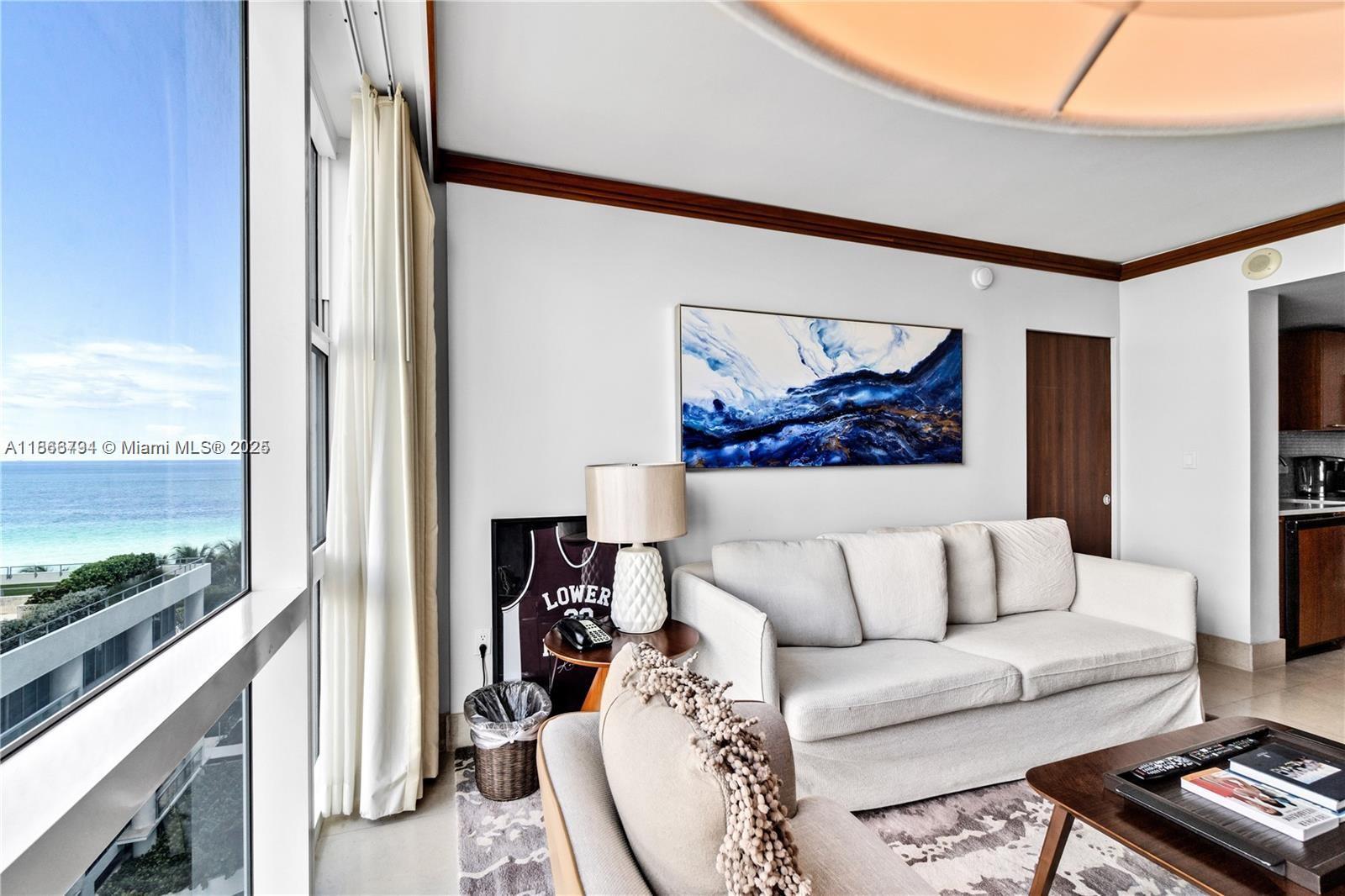 Experience luxury living at the prestigious Carillon Miami Beach. This fully renovated 2-bedroom, 2-bath residence offers 887 sq ft of elegant living space with breathtaking  views. Enjoy marble floors, high-impact windows, and a modern open layout. Owners benefit from world-class resort amenities including spa, fitness center, four pools, beach service, restaurants, 24/7 security, and valet.