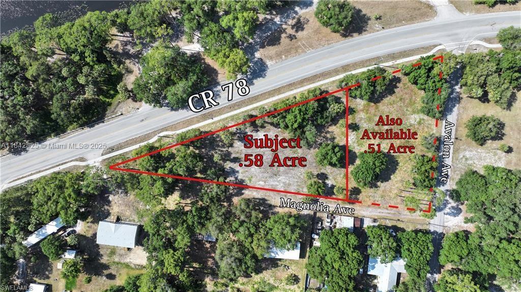 HE CONVENIENT LOCATION… UNIQUE TRIANGULAR LOCATION PROVIDES A HOME SITE WITH PERSONALITY PLUS FOR YOUR POOL, PICNIC, OR GARDENING AREA. Location is right on County Road 78 with quiet ingress & egress on little-traveled Magnolia Avenue. Home site has recently been cleared with some trees interspaced throughout including the perimeters for privacy. Home site offers river views across from LaBelle's public Lions Club Park and is within walking/biking distance to downtown LaBelle, restaurants, banking, shopping, library, post office and more. The Hendry County Boat Ramp and Docks are just a stone’s throw for boaters/fishermen and use of those facilities are fee to the public. Lot size is one-half+ acre with room for your primary residence plus barn/workshop/studio, too!