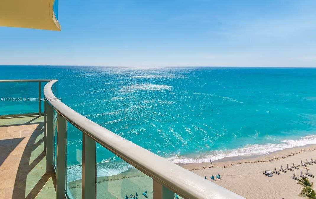 Experience this spectacular modern, completely remodeled 2 BD residence, offering direct ocean views. Enjoy large wraparound balcony where you can soak in the breathtaking ocean scenery. Hurricane-proof windows will provide peace of mind. Open-concept kitchen features a Calacatta island and high-end appliances, perfect for entertaining or enjoying a quiet meal with the ocean as your backdrop. Spacious walk-in closets offer ample storage space. The Wave- one of the finest buildings on the beach offers Resort-style pool deck featuring lush palm trees, soothing fountains, a  Jacuzzi, Gym overlooking the ocean. Complimentary beach services. Great for investors or those seeking a vacation home. Rent up to 4 times per year. Pet-friendly building. Perfect location!
