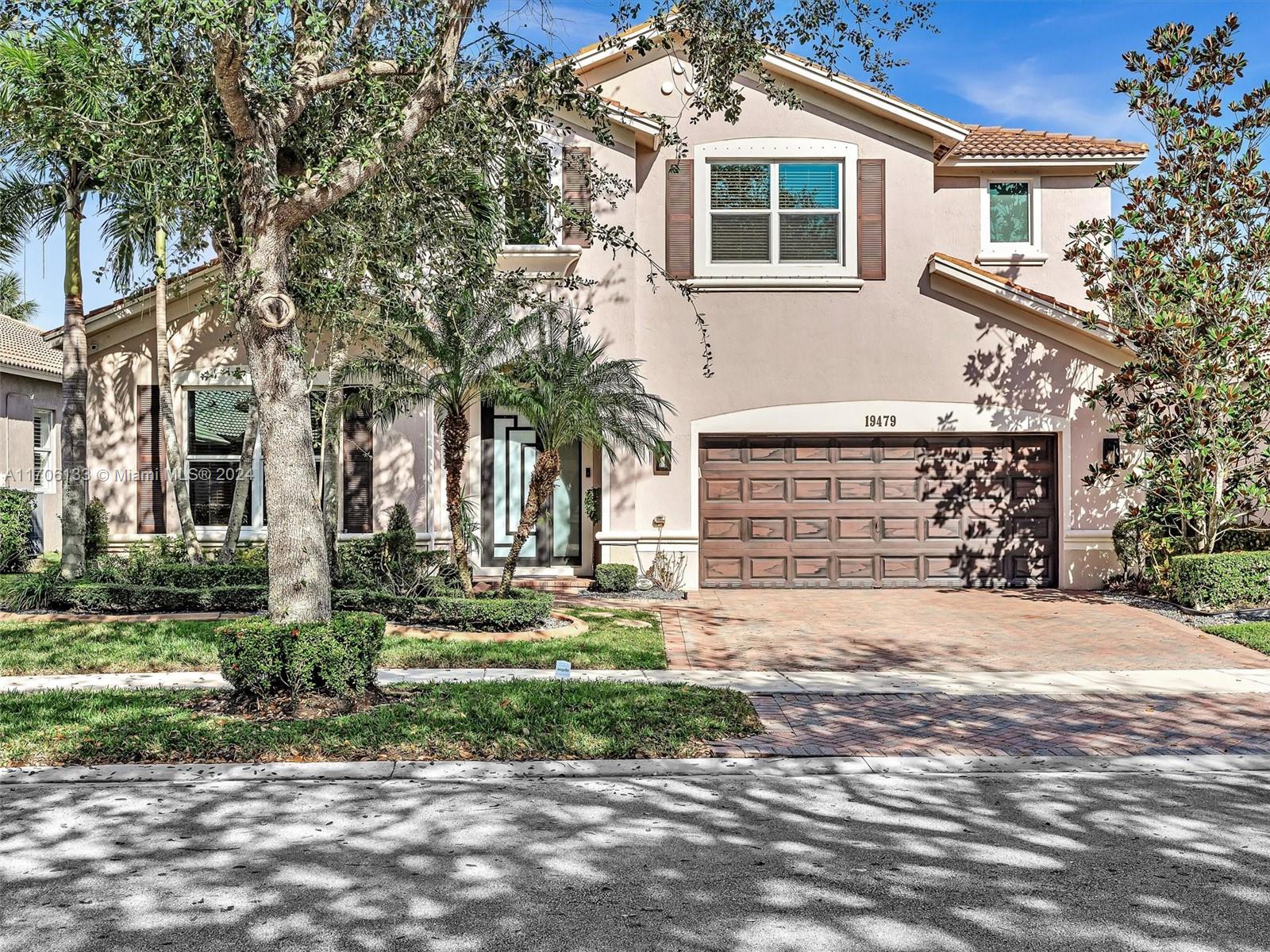 Nestled on private waterfront lot, this stunning 5 bed/ 4bath + loft home has both sophistication and comfort. The park-like backyard overlooks the lake and features a covered and extended patio with retractable awning, perfect for family gatherings, entertaining guests or dining al fresco. Inside, the foyer invites you into the formal living and dining rooms and then continues into the chef's kitchen w/informal eating area which overlooks the spacious family room. All bathrooms have been recently updated. 1 bed/1 bath downstairs. Electric car charger. Guard gated community w/clubhouse featuring heated pool, gym, volleyball and basketball courts, pool table, playroom, and playground. Lawn maintenance, basic cable and internet included. Top notch schools! Small pets welcome. Move in Ready!
