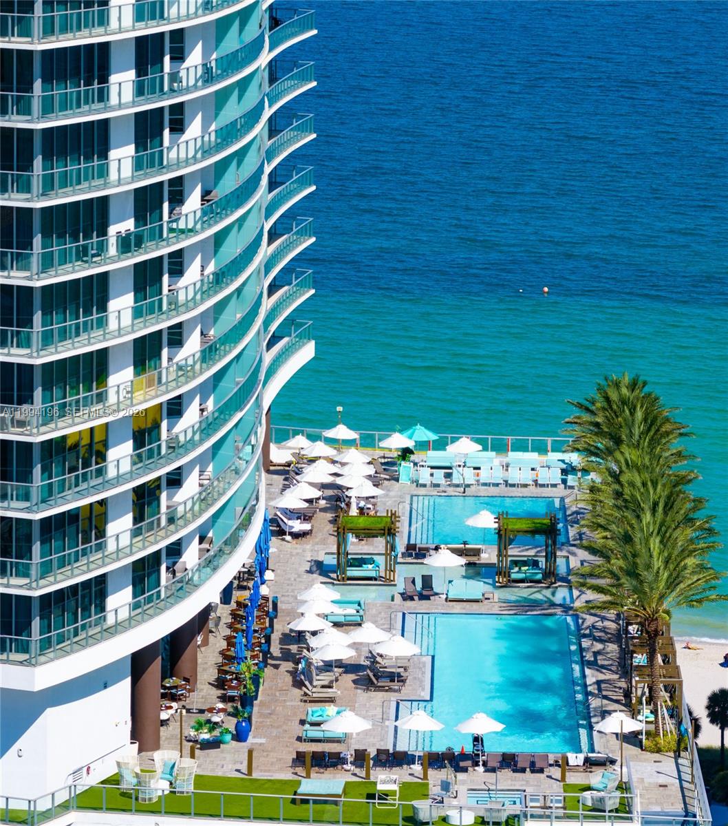 Turn-key oceanfront income-producing residence located directly on the sand at LYFE Resort & Residences. This high-floor 2-bedroom, 2-bath unit on the 30th floor offers breathtaking panoramic ocean and Intracoastal views, extending all the way to Fort Lauderdale, with spectacular scenery both day and night.

Offered fully furnished and ready for immediate use or rental, the unit features approximately 1,275 SF of interior space and 1,590 SF total, including an oversized private terrace designed to maximize the views and outdoor living experience.

The Resort allows unlimited short-term rentals (minimum 2 nights), making this a true income-generating asset. Owners have full flexibility to self-manage (Airbnb, etc.) or use one of the multiple available property management options.

The residence features a modern open layout, floor-to-ceiling windows, and a bright living area that seamlessly connects to the balcony — a key driver for high occupancy and premium nightly rates.
Enjoy a full-service resort experience including a state-of-the-art fitness center, luxury spa with salon services, heated oceanfront pool with exceptional ambiance, and a high-end on-site restaurant.
A rare opportunity to own one of the best positioned high-floor units in the building — combining premium views, full operational flexibility, and strong rental potential.

Strong occupancy and premium nightly rates driven by exceptional views, location, and full-service resort amenities.
