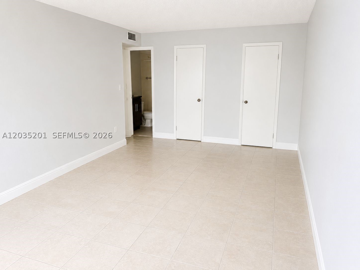 Excellent investment opportunity with a highly motivated seller! This spacious 2-bedroom, 2-bath condo features a large primary suite with a walk-in closet, updated kitchen and bathrooms, and a functional layout. Currently vacant and easy to show, with rental potential of up to $2,500 per month. Enjoy the security and convenience of a gated community with 24/7 guard-gated access and resort-style amenities, including an Olympic-size pool, fitness center, tennis courts, and on-site laundry facilities. Whether you're looking to expand your investment portfolio or purchase a future home, this property offers exceptional value. Bring your offer!