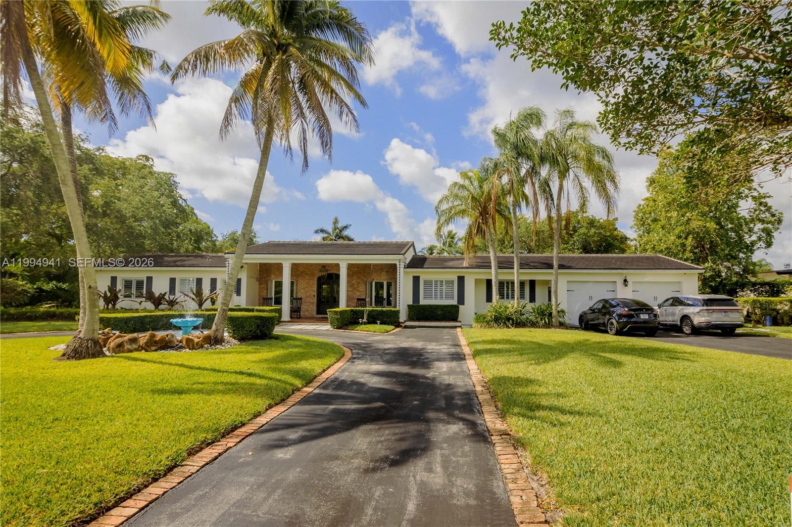 This is the compound Miami almost never offers at this price — half an acre, over 4,000 sq ft of living space, a fully detached guest house, and a location that puts everything within reach.

The main residence is a 4-bed, 3-bath single-story estate with a split floor plan designed for real living. The open living area flows into a formal dining room with pool views — built for both Sunday mornings and large-scale entertaining. Three bedrooms and two baths anchor the left wing, including an en-suite. On the opposite side, a gourmet kitchen opens to a generous family room. The primary suite delivers dual vanities, a soaking tub, walk-in shower, and a custom closet.

The fully detached 1-bed, 1-bath guest house has its own kitchen and living area. Use it for extended family, visiting guests,. On nearly 28,000 sq ft — with no HOA — the outdoor space gives you room to expand, build, or simply breathe.

Minutes from Baptist Hospital, Dadeland Mall, the Metrorail, University of Miami, and South Miami's best dining. No income tax. No HOA. No compromises.

5 BD | 4 BA | 4,000+ SF Living | 28,000+ SF Lot | Pool | Guest House | No HOA