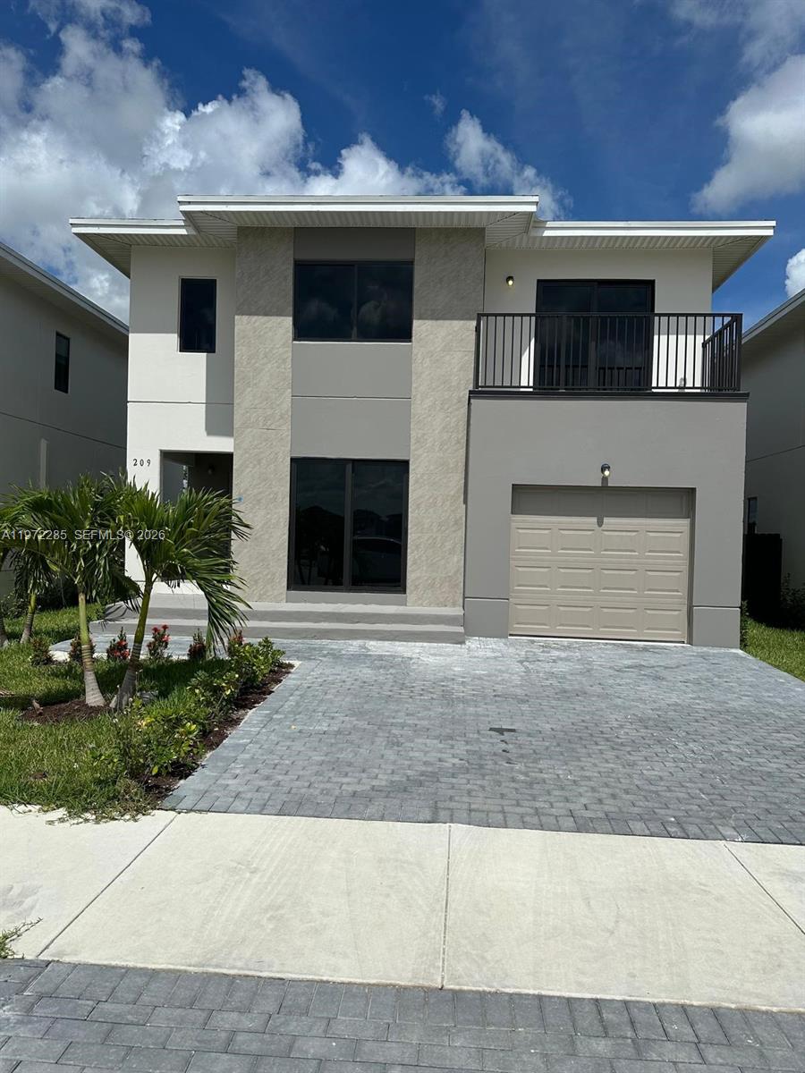 Brand-new construction offering 5 bedrooms and 4 full bathrooms with a spacious garage and modern design throughout. This home features all-new roof, plumbing, electrical, HVAC, impact windows, and high-quality finishes. Open-concept layout with generous living areas, a beautifully designed kitchen, and ample natural light. Move-in ready with everything thoughtfully built from the ground up. No updates needed — just bring your furniture and enjoy.