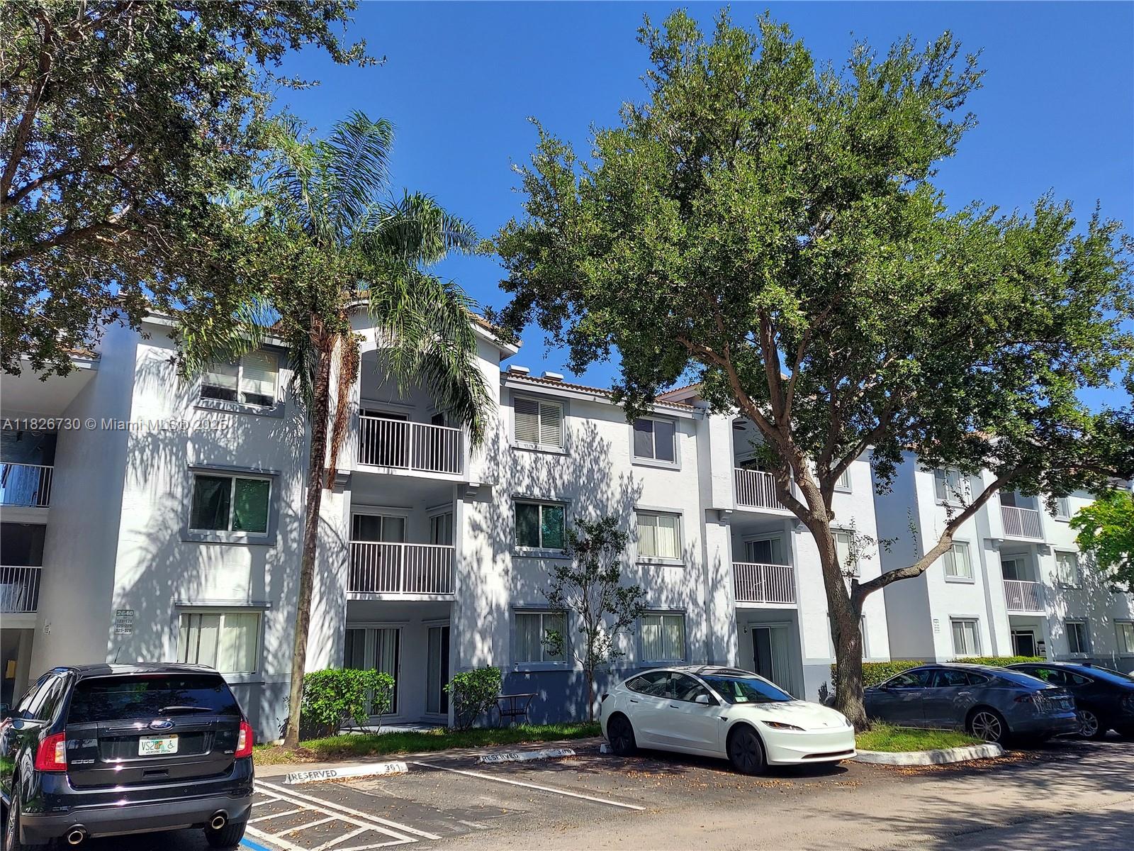 Step into this warm & inviting first-floor corner condo, featuring a functional 2 bed/2 bath split floor-plan, a kitchen that opens up to a living area flooded with natural light thanks to a private balcony, accessible also from the spacious bedrooms with large closet spaces, a new full-size washer/dryer, one assigned parking space. Pet friendly building, up to 2 pets & 50 lbs, and amenities including Pool, Gym, Club House, Basketball & Tennis Courts. Ongoing improvements in the community to enhance the aesthetic appeal and the safety and accessibility. Nestled in a prime location in high demand, near NSU colleges & A+ schools, major highways, shopping, restaurants, and hospitals, provides an  excellent investment opportunity. Can lease right away for periods not less than 1 year!