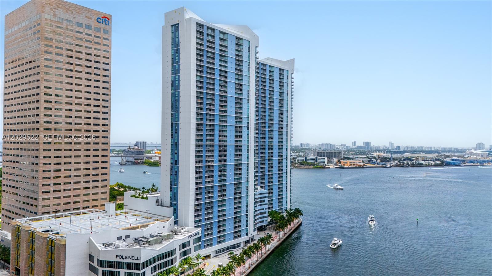 Live above it all at One Miami! This beautifully maintained 2-bed, 2-bath split floor plan on the 22nd floor offers sweeping southern views of the bay and river that will take your breath away. The open kitchen, porcelain flooring, and laminate wood bedrooms make this home as stylish as it is functional. Freshly painted and completely move-in ready. Resort-style amenities include two pools, two fitness centers, a sun deck, clubhouse, and round-the-clock security, all in the heart of downtown Miami. Come see it! Vacant and easy to show!
