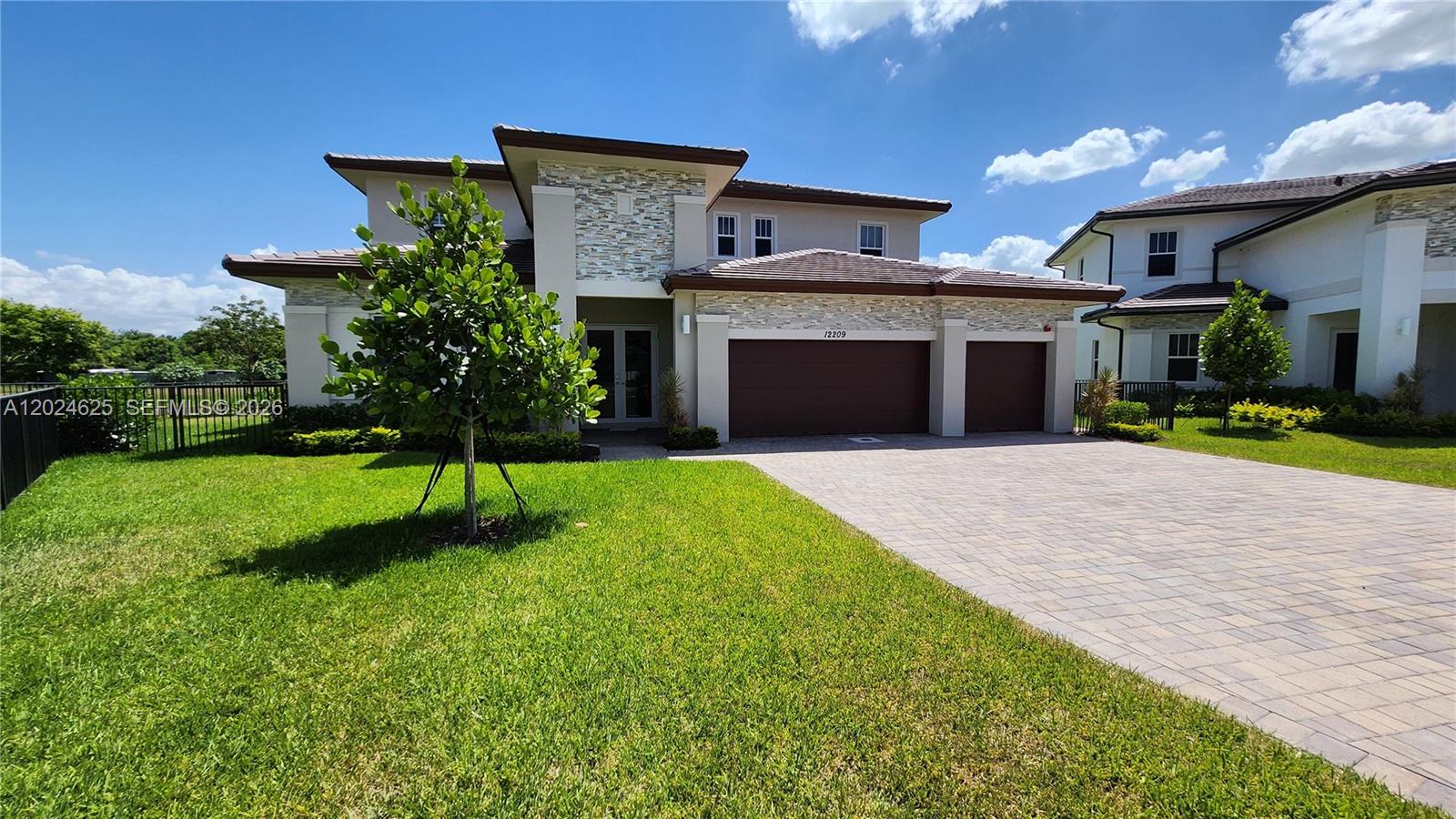 Brand new home, 5 bedrooms and 4.5 bathrooms, located in Davie between Flamingo and Griffin Road, with quick access to I-75. This beatiful home sits on a rare double-sized CORNER LOT by the lake, providing extra space and privacy. The first floor features polished marble flooring, second floor and stairs have modern laminated flooring. The kitchen is spacious with high-end finishes and a large island. The garage has a very nice and durable flake epoxy flooring. Close to parks, good schools, shopping, and dining. Schedule your tour today