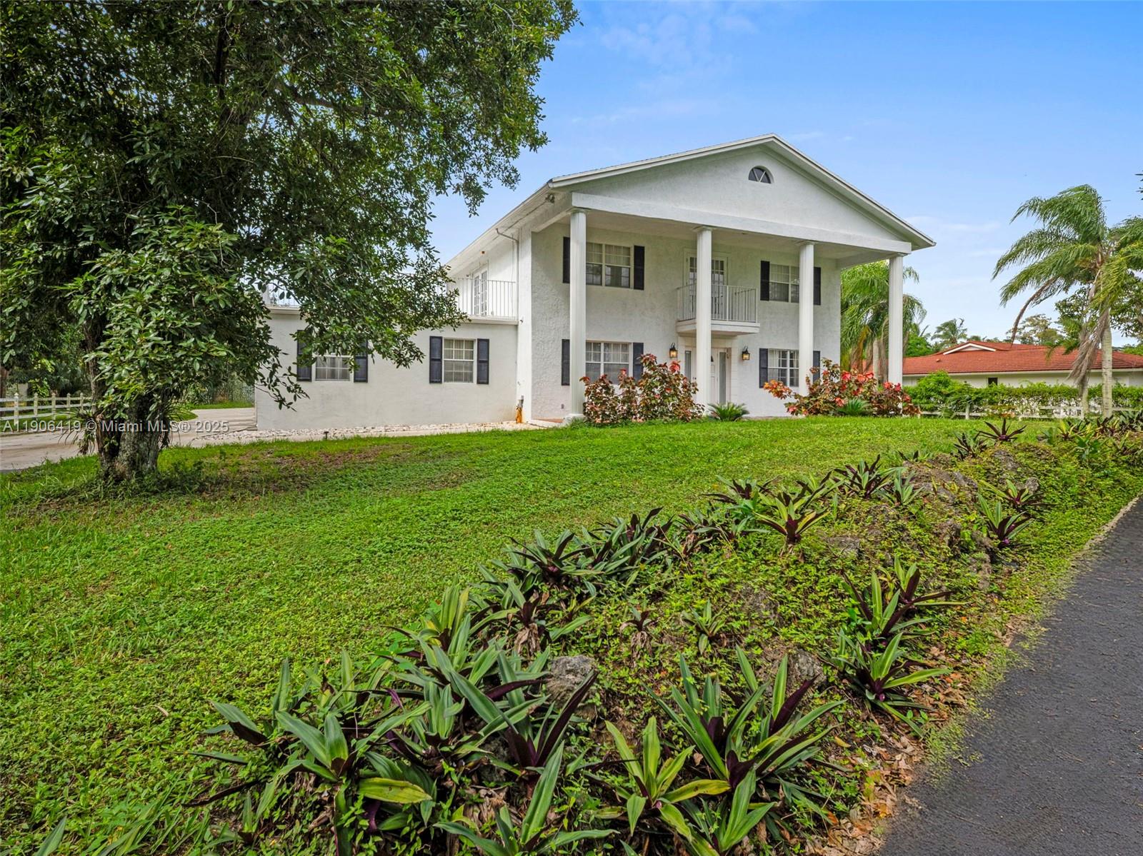 Welcome to this stunning 3-bedroom, 3-bath colonial-style home, featuring elegant columns, a sparkling pool, and beautifully landscaped outdoor living spaces. Nestled in one of Parkland’s premier horse-friendly neighborhoods, this property sits on rare acreage—perfect for horses, recreation, or future expansion.

Inside, the home boasts a modern kitchen with GE appliances, two air conditioning units (one upgraded with a germicidal UV light in 2018), and a Rheem water heater installed just three years ago.

Zoned for top-rated schools — Riverglades Elementary, Westglades Middle, and Marjory Stoneman Douglas High — this residence offers the perfect blend of privacy, space, and lifestyle.

Your dream home awaits!