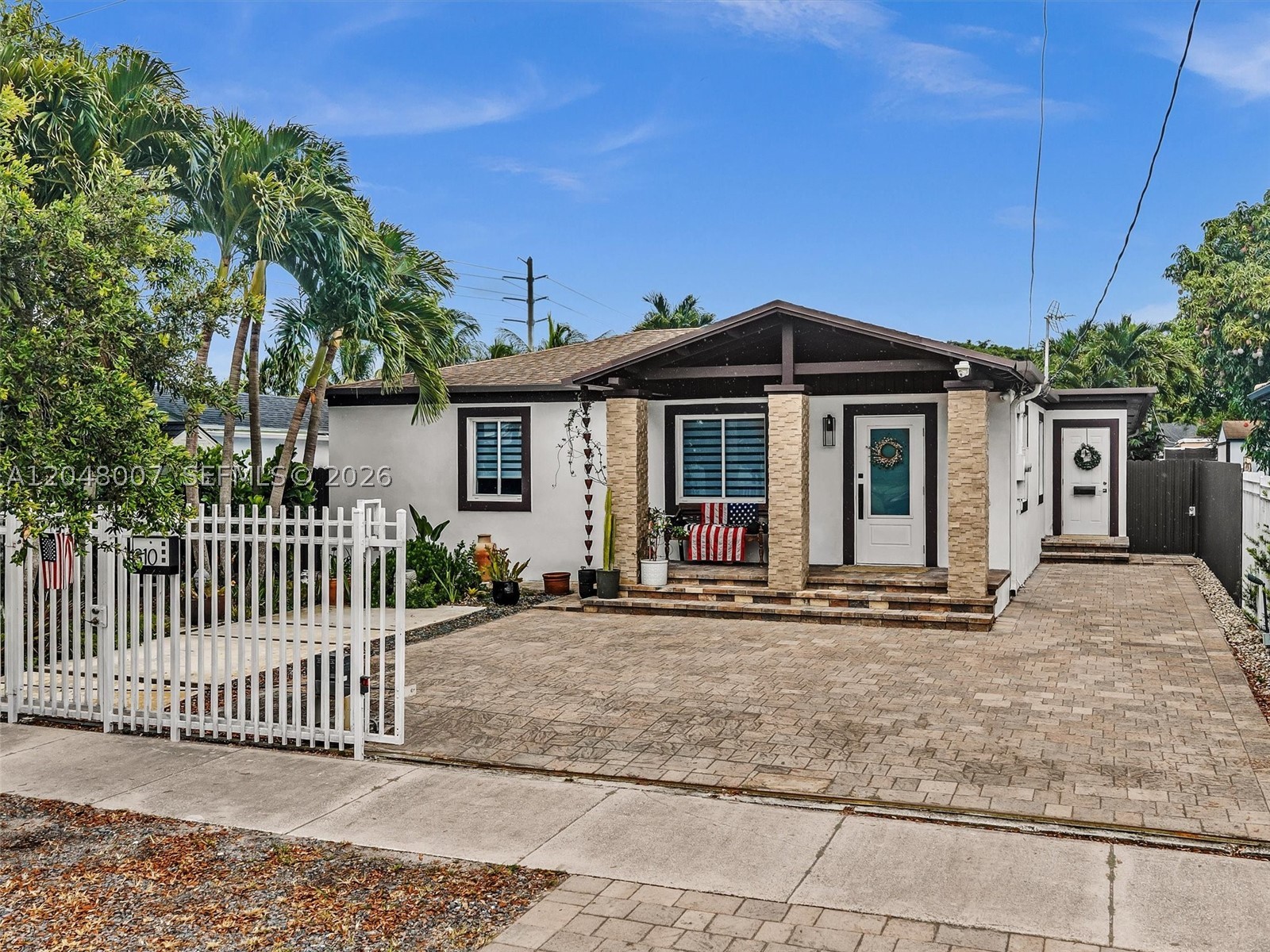 Exceptional opportunity to own a versatile and well-maintained property in the heart of Miami! The main home features 3 bedrooms and 1 bathroom with high-impact windows and doors, abundant natural light, and a functional layout. A separate 1-bedroom, 1-bath in-law quarters provides excellent flexibility for extended family, guests, or potential rental income. The property also includes an additional detached structure with existing plumbing that is currently used as a laundry room and storage but offers excellent potential for conversion into a home office, studio, workshop, or other permitted use. Major improvements have already been taken care of, including two A/C units and a roof that are all in excellent condition and meticulously maintained. Enjoy the convenience of expansive stone driveways with ample parking for multiple vehicles, boats, or recreational equipment, plus a fully automated gated entrance for added privacy and security. The home is also equipped with an alarm system for additional peace of mind. Centrally located near major highways, shopping, dining, schools, and Miami International Airport. A rare property offering flexibility, functionality, and endless possibilities.