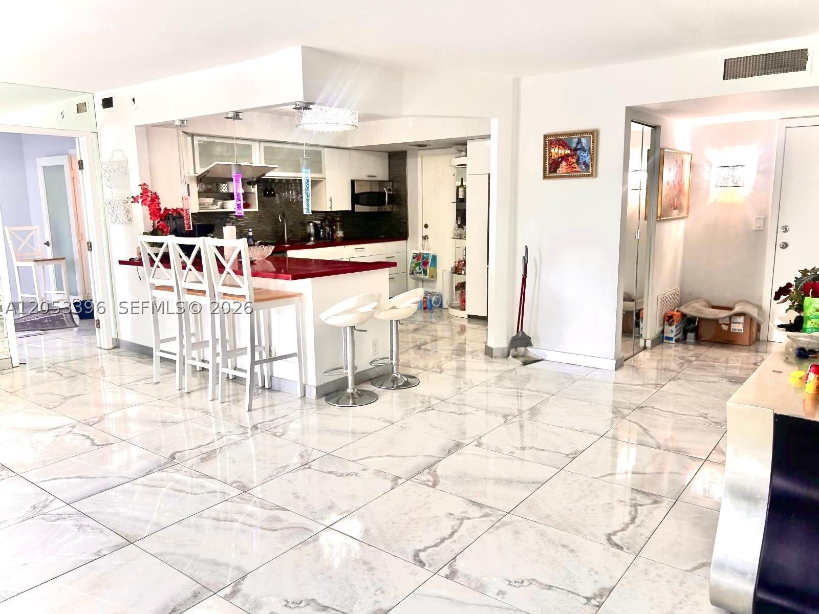 Beautiful corner residence in the heart of Hallandale Beach! This bright and spacious condo offers an abundance of natural light, a desirable open layout, and a large private balcony perfect for relaxing and enjoying the views. The unit is in excellent condition and features comfortable living spaces ready for personal touch. Located in a well-maintained waterfront community on the Intracoastal, offering resort-style amenities including two swimming pools, fitness center, sauna. Enjoy the convenience of being just a short walk to the ocean, as well as nearby restaurants, shopping, medical centers. A fantastic opportunity to live the South Florida lifestyle in a prime Hallandale Beach location.
