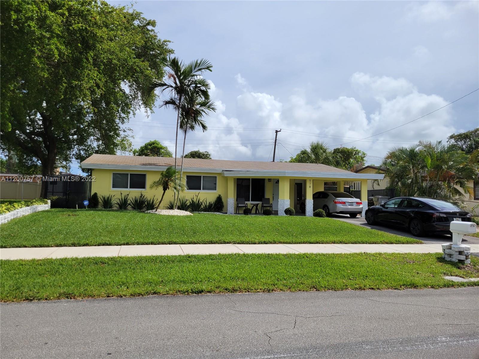 Lovely updated three-bedroom home with two updated bathrooms.  Cooking is a pleasure in the large and also updated kitchen with stone counters and stainless appliances. One of the best features, you will love the large family room that can be an office, den, gym or fourth bedroom. Just painted inside and out will provide years of carefree Florida living.  The home comes with a nicely landscaped fenced yard and covered parking in the carport. Last, but not least, a great location that is near I-95, shopping and minutes to the beach.