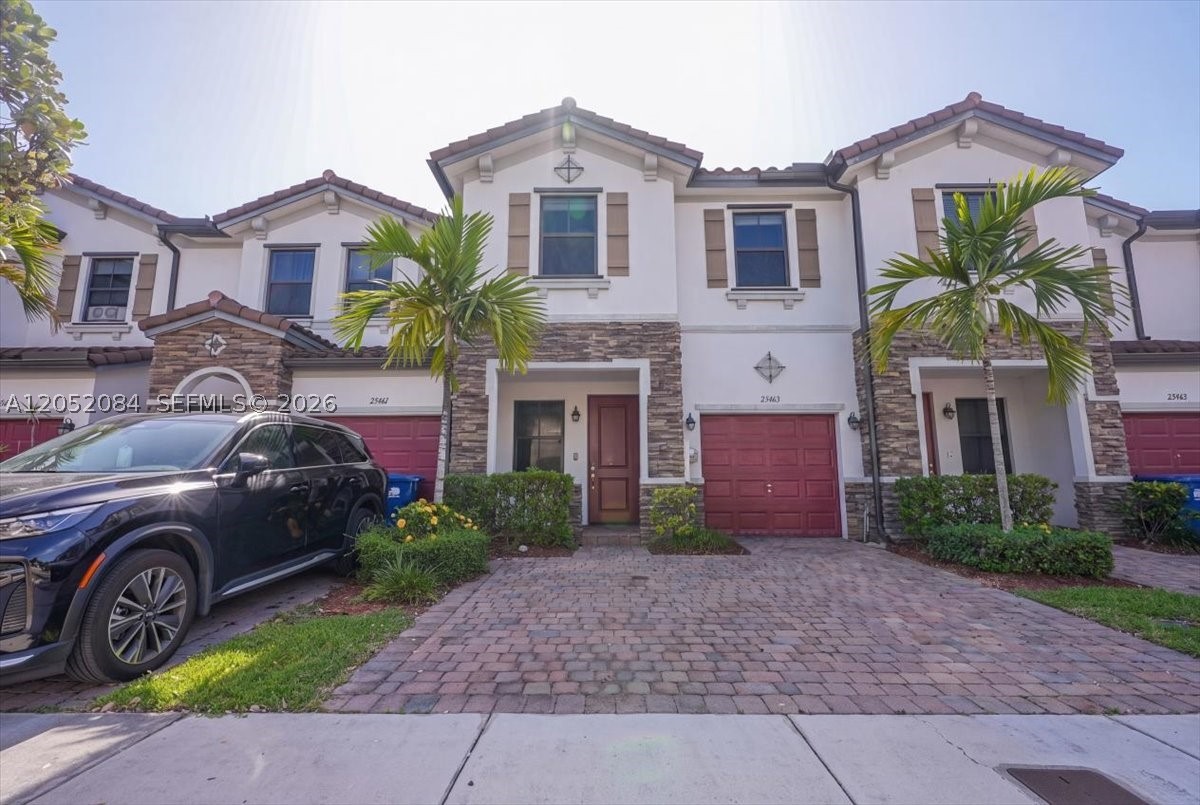 Beautifully maintained 3 Bedrooms, 3 Baths townhome located in the highly desirable gated community of Artesa by exit 9 off the turnpike. This spacious home features an open-concept floor plan, a modern kitchen with granite countertops, stainless steel appliances, and ample cabinet space. The first floor includes a full bathroom and flexible living space that can easily be converted into a 4th bedroom, home office, or guest suite. Upstairs you'll find three generously sized bedrooms, including a spacious primary suite with a walk-in closet and private bath. Enjoy a private fenced backyard, perfect for entertaining or relaxing. Artesa offers resort-style amenities including a clubhouse, swimming pool, fitness center, basketball court, volleyball court, playgrounds, walking paths, and 24-hour gated security. Conveniently located near the Florida Turnpike, shopping, restaurants, schools, and Homestead Air Reserve Base. Move-in ready and easy to show!