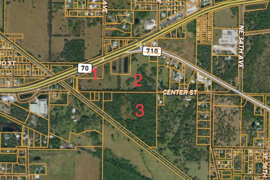 We are pleased to present 56.16 Acres of Vacant Land on SR 70. (1.5 miles east of US 441 & SR 70). 3 Separate parcels, approximately 1295' of frontage combined. The 2.5AC parcel is Zoned:Residential Single Family (RSF). Future Land Use (FLU) is COMMERCIAL CORRIDOR MIXED USE (Commercial or Light Industrial Use & Residential Development site plan must be approved by Okeechobee Co). 2 remaining parcels zoned: AGRICULTURE(A). Future Land Use (FLU) URBAN RESIDENTIAL MIXED USE (Maximum 18 Units per acre/ site plan must also be approved by Okeechobee Co) Has electricity & municipal water access. Sewer 1/2 mile NE of site. Parcel 1&2:X, Parcel 3:X500. PID 1:1-14-37-35-0050-0000-0010 (2.52 AC/DOR IMP), PID 2: 1-14-37-35-0A00-00006-0000 (26.09 AC/DOR IMP)PID 3: 1-23-37-35-0A00-00003-0000 (27.54 AC/DOR NAT).