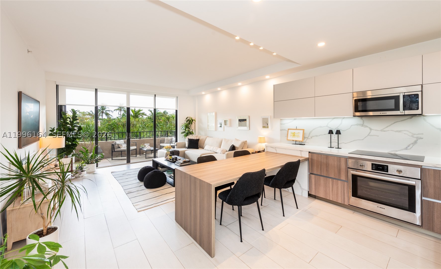 Fully renovated 2-bedroom + ENCLOSED den, 2-bathroom residence with a thoughtful, high-end transformation that goes beyond a typical remodel. The interiors reflect a clean, modern design with custom finishes and carefully integrated upgrades throughout.
The open kitchen is designed for both functionality and entertaining, featuring a sleek bar, stainless steel appliances, and seamless connection to the main living area. Custom built-in closets have been incorporated across the residence, maximizing storage while maintaining a refined aesthetic.
The layout offers an ideal flow, with the living room and both bedrooms opening directly onto an oversized balcony. This outdoor space becomes a natural extension of the interiors, overlooking the pool area with completely open south-facing views—no neighboring buildings in sight—providing light, privacy, and a sense of openness rarely found.
The primary suite includes a spacious walk-in closet and a fully renovated bathroom, executed with elevated finishes. The enclosed den adds versatility, ideal as a home office, guest space, or media room.
A unique offering within the building, combining design, functionality, and unobstructed views. Residents enjoy a full suite of amenities including gym, Olympic-size pool, tennis courts, playground, and direct beach access, making it especially appealing for families. Unit is rented until July 31, 2026.