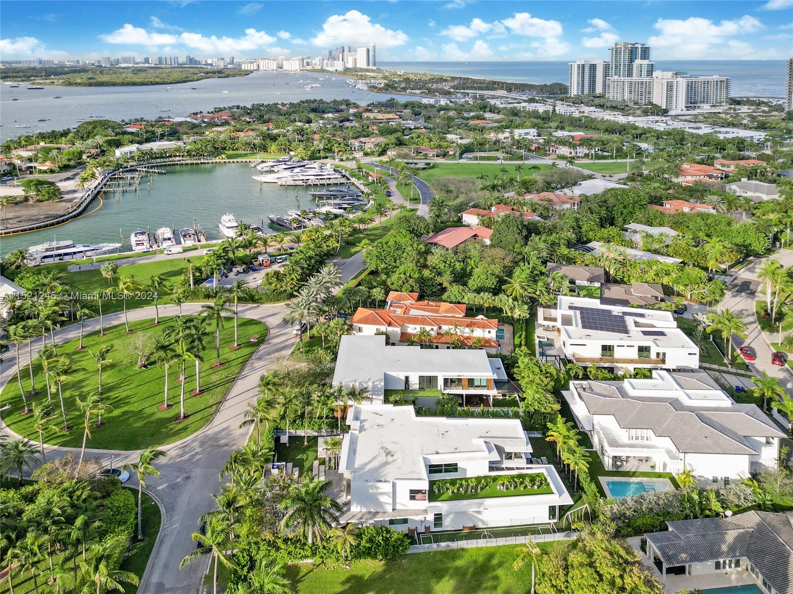 Live in exclusive gated community, Bal Harbour Village, magnificent state of the art KZ Architecture Jaya Kader, 6 bedroom 6.5 bathroom (Steam in primary bedroom) Excellent location, across from the marina, modern home, 7,283 sqft total area 5,944 sqft adjusted area 30 x 60 Italian porcelain floors in common areas, wood floors in bedrooms, walk-in built-in closets, automatic blinds, spectacular kitchen high end appliances  (Subzero, Wolf, Aako and Lynx), quartz countertops, high ceilings, floor to ceiling glass, solid flush frame no casing doors, elevator, built in vacuum system, beautiful covered terrace, summer kitchen, oversize heated pool with jacuzzi, smart home. Walking distance to beaches, world renown Bal Harbour shops, parks, restaurants, places of worship, A+ schools and more
