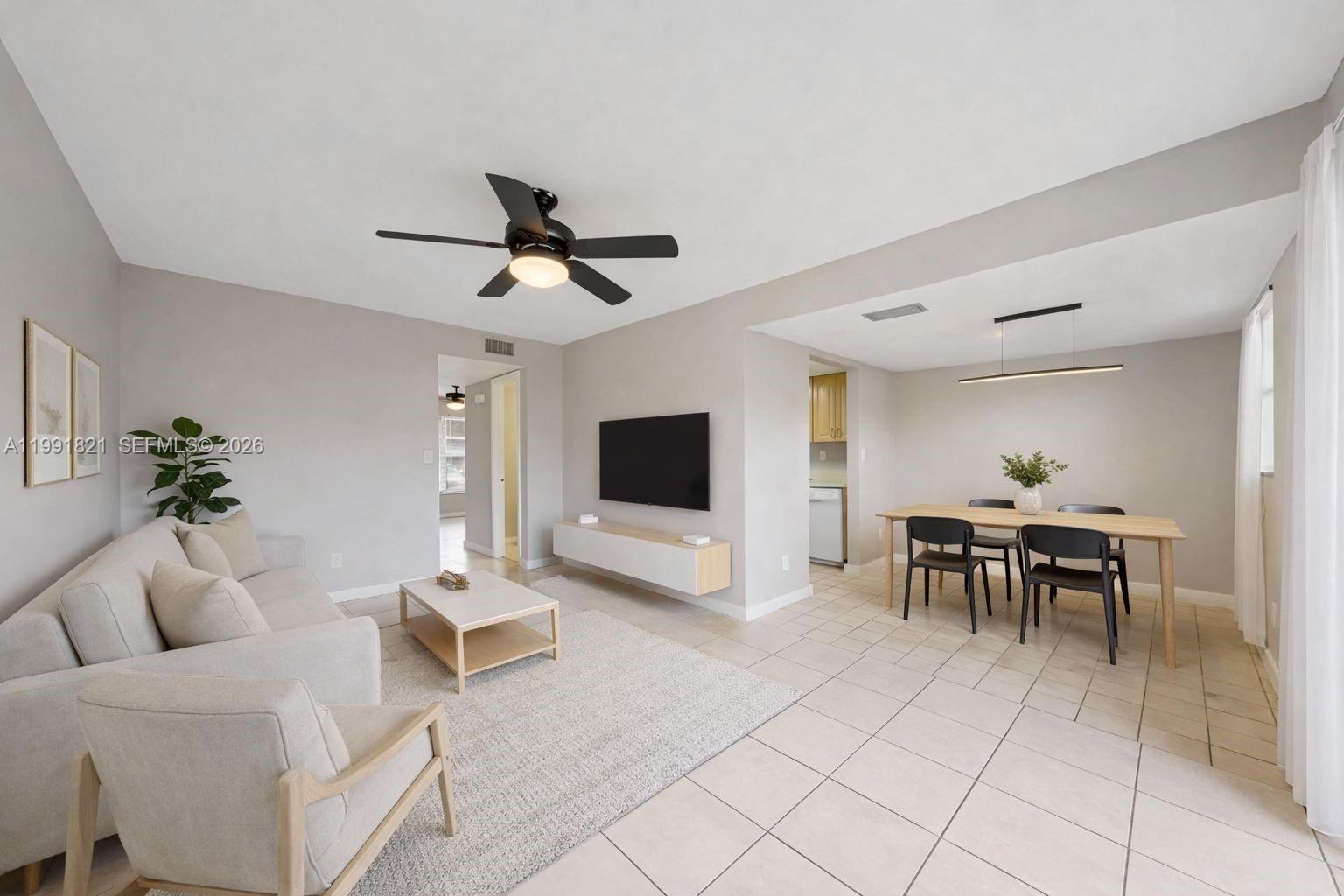 Excellent opportunity for investors! This rented bright and spacious 3/3 2-story residence offers a comfortable and functional layout, and perfect rental investment. There is space for extra room/den convert. The home features tile and laminate flooring throughout, an updated kitchen and bathroom, central A/C, and a convenient in-unit washer and dryer.
Also has its own private fenced backyard, ideal for outdoor relaxation, along with a small storage space for added convenience.

Ideally located with easy access to major roads, and just minutes from the Hard Rock Casino, shopping, dining, and entertainment.

Great potential as a primary residence or income-producing property in a high-demand area!