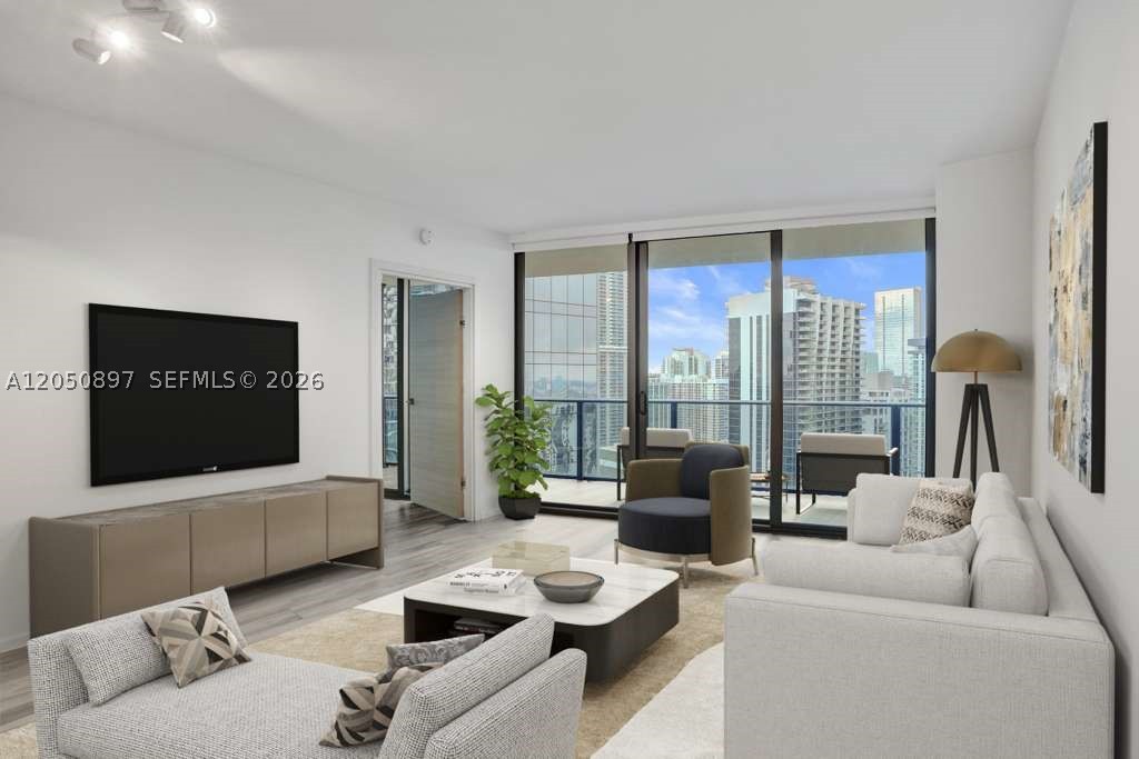 Beautiful unit in the luxury building of the SLS LUX. Located across from the Brickell City Center. 1 bedroom + DEN /2 full bathrooms with spectacular city and water views, private elevator foyer, Italian kitchen and tile floors. Unit has the following upgrades: marble kitchen counter tops, LED illuminated back-splash, beautiful master closet finishes and textures, electric-powered shades and blackouts. On the 9th floor SLS Lux has the most beautiful amenities: 2 pools, cabanas, lots of lounge areas to relax, mini golf, outdoor climbing wall & workout machines, kids playroom, gym, spa and sauna/steam room, valet and hotel service.