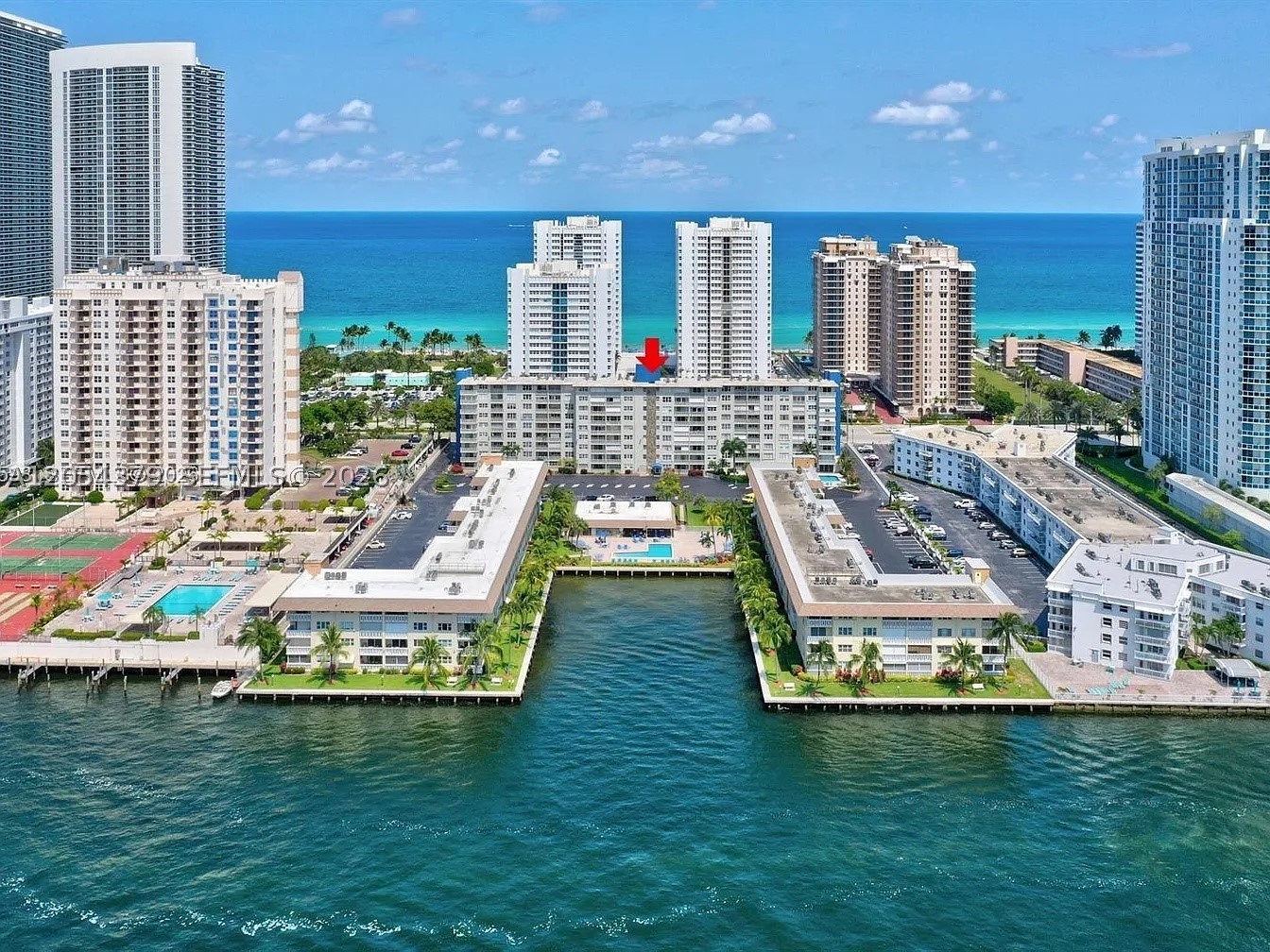 Coastal living at its finest! This beautifully maintained 1-bedroom, 1.5-bath residence is ideally located just a short distance from Hallandale Beach, offering the perfect blend of comfort and convenience. Enjoy two community pools, including a stunning waterfront pool overlooking the bay, a fully equipped fitness center, two clubhouses, and beautifully maintained grounds. The unit is offered fully furnished for a seamless move-in experience, with furniture negotiable if preferred. The property also includes one assigned parking space and two guest parking passes for added convenience. Conveniently located near shopping, dining, grocery stores, Gulfstream Park, Aventura Mall, and major highways. Whether you’re searching for a primary residence, vacation home, or seasonal retreat, this property offers the South Florida lifestyle you’ve been looking for.