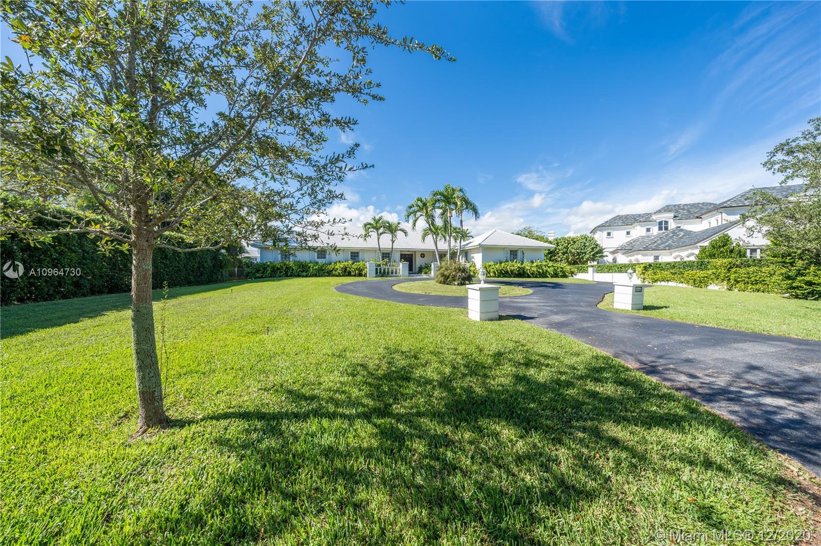 Customize this mid-century one-story home with a new roof or build your own masterpiece. Located on Gallardo street this three-bedroom, two-bathroom residence. Best neighborhood to have a Village feel in a big city with acre lots and treelined streets to enjoy walks and jogs. Wonderful Village amenities with a very family friendly atmosphere in a centrally located region of Miami. Prime opportunity to own over 1/2 acre in one of the most coveted areas of Coral Gables. Sprawling green land surrounds the existing home, together with natural coral rock on the property.