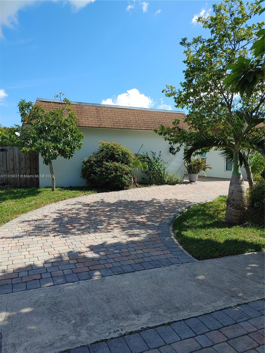 This is a spacious, bright, and beautiful four-bedroom and three-cabana bath with a saltwater pool. This home has big rooms with a master bedroom with a walking closet, living room, family room, wet bar, and modern kitchen with stainless steel appliances all in perfect working condition. There is circular parking in front of the house.  There is a big space to the left of the house to park a boat. The yard is full of mango trees, avocados, jackfruit, fig, etc. Is nice for entertainment. The entire home has marble and travertine floors. Impact windows and doors. It is freshly painted and move-in-ready. This home is in the heart of the plantation near restaurants, colleges, universities, shopping, parks, and major roads. No HOA. Do not miss this opportunity.