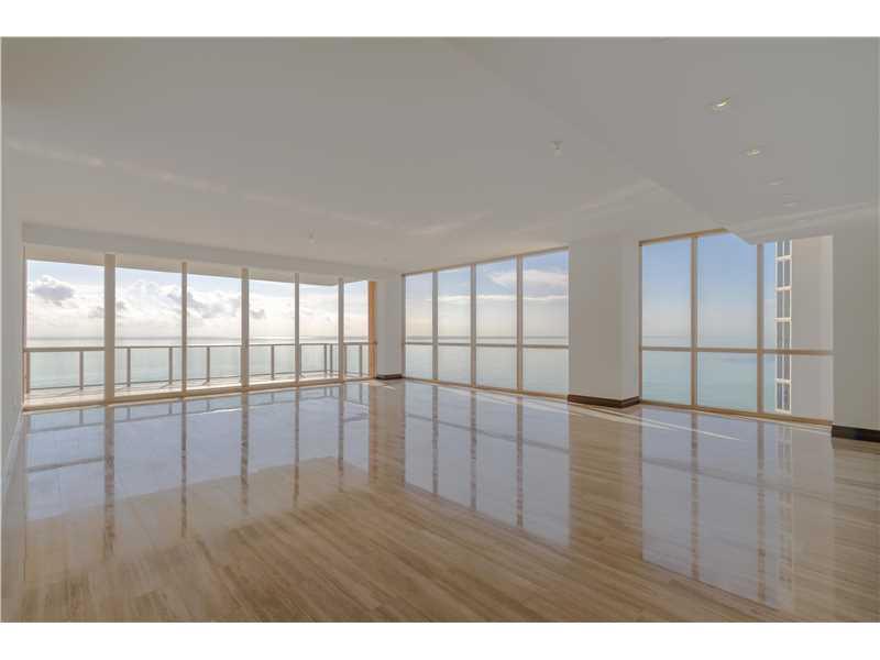 Modern finishes with upgraded millwork package (includes doors/frames/baseboard), Crestron/Smart home, marble floors, wood bedrooms, convertible fourth bedroom, leather-clad closets, fireplace, recessed lighting, 10'6 ceilings, modern kitchen w/ Miele appliances, Onyx master bathrooms, hot tub & summer kitchen on terrace. Rolls Royce house car, spa with Hammam, wine/cigar lounges, access to Acqualina restaurants.