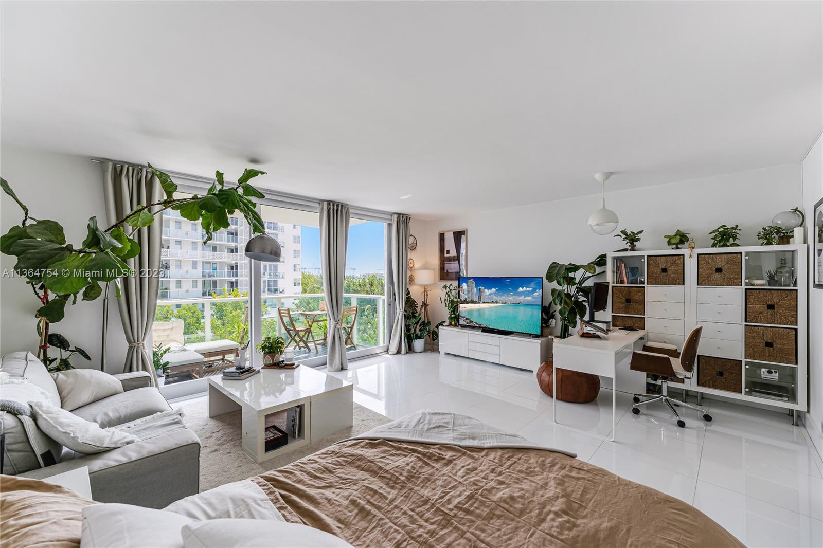 Remodeled bright studio on trendy West avenue. Private balcony with partial bay and city views. White glossy kitchen cabinetry, quartz countertop with stainless steel appliances. Modern bathroom with bowl sink and bathtub. Walking distance to the beach, shopping, and dining. All Mirador amenities - gym, pool, in-building convenience store.