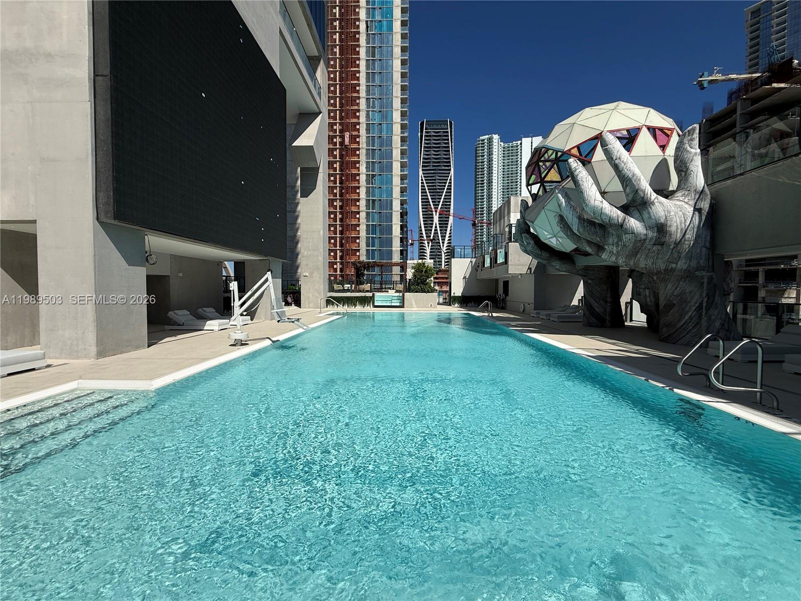 Fully furnished, turnkey residence in one of Miami’s most sought-after new construction developments, E11EVEN Residences Miami. Located in the centrally positioned Park West District, this 65-story tower offers short-term rental flexibility with daily leasing permitted.
The unit features panoramic views of the Miami skyline with modern finishes and a thoughtfully designed layout.
Residents enjoy a full-service lifestyle 24/7 with amenities including a modern lobby, curated art installations throughout the common areas, a sports lounge with stadium-style seating and LED video wall, a fitness center, spa and wellness spaces, yoga and meditation areas, bar and lounge, and a multi-level pool deck with cabanas overlooking the city.
Private beach access is available for owners.
