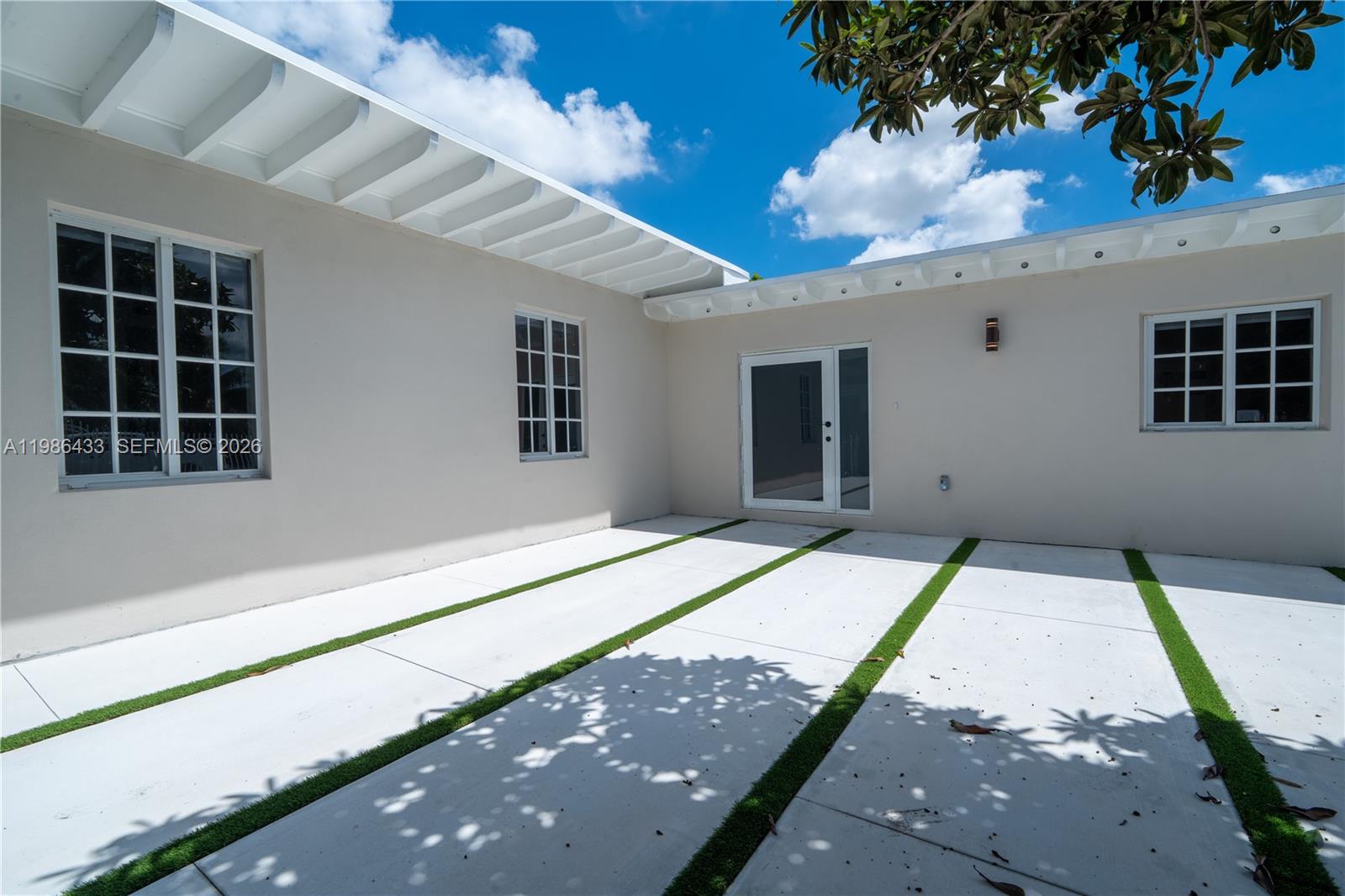 Completely remodeled 5BR/3BA home featuring impact windows and doors, quartz countertops, new appliances, and modern finishes throughout. Spacious layout with ample parking and a large fenced yard. Move-in ready and conveniently located near major highways, shopping, dining, and Miami’s top attractions. 10-15 min from Wynwood.